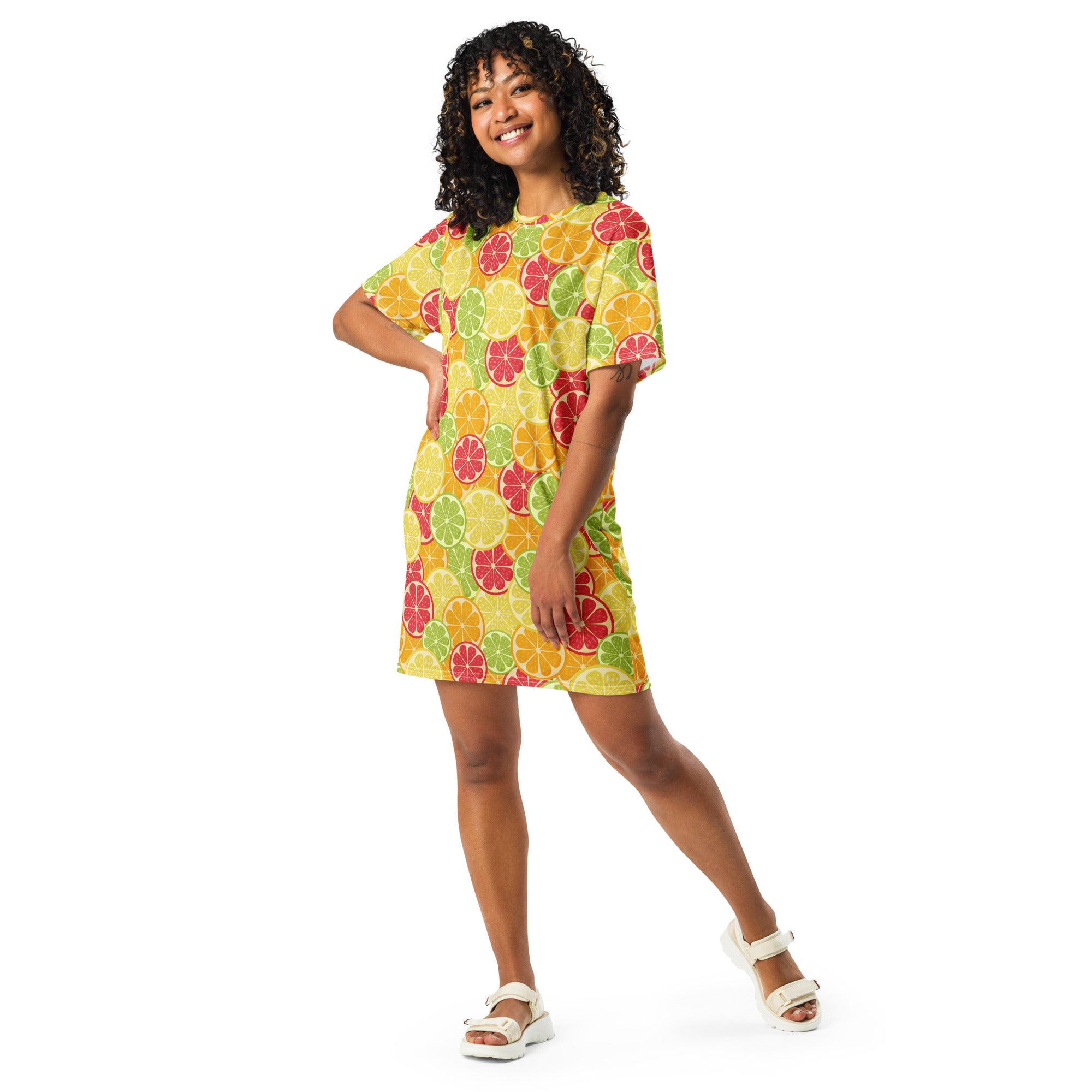 Women’s citrus fruit t-shirt dress in vibrant yellow with short sleeves and a colorful sliced citrus fruit pattern