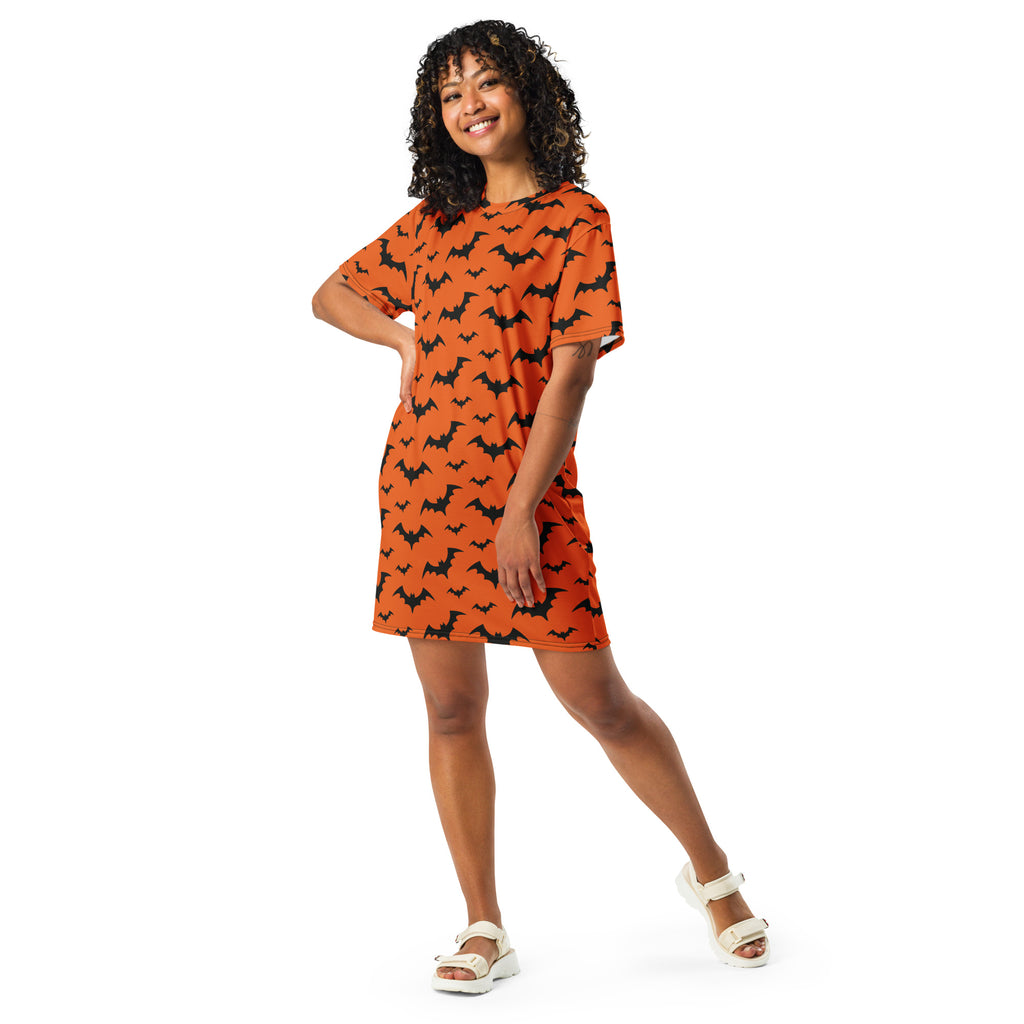 Women’s orange short-sleeved cotton t-shirt dress with black bat print for Halloween festive wear