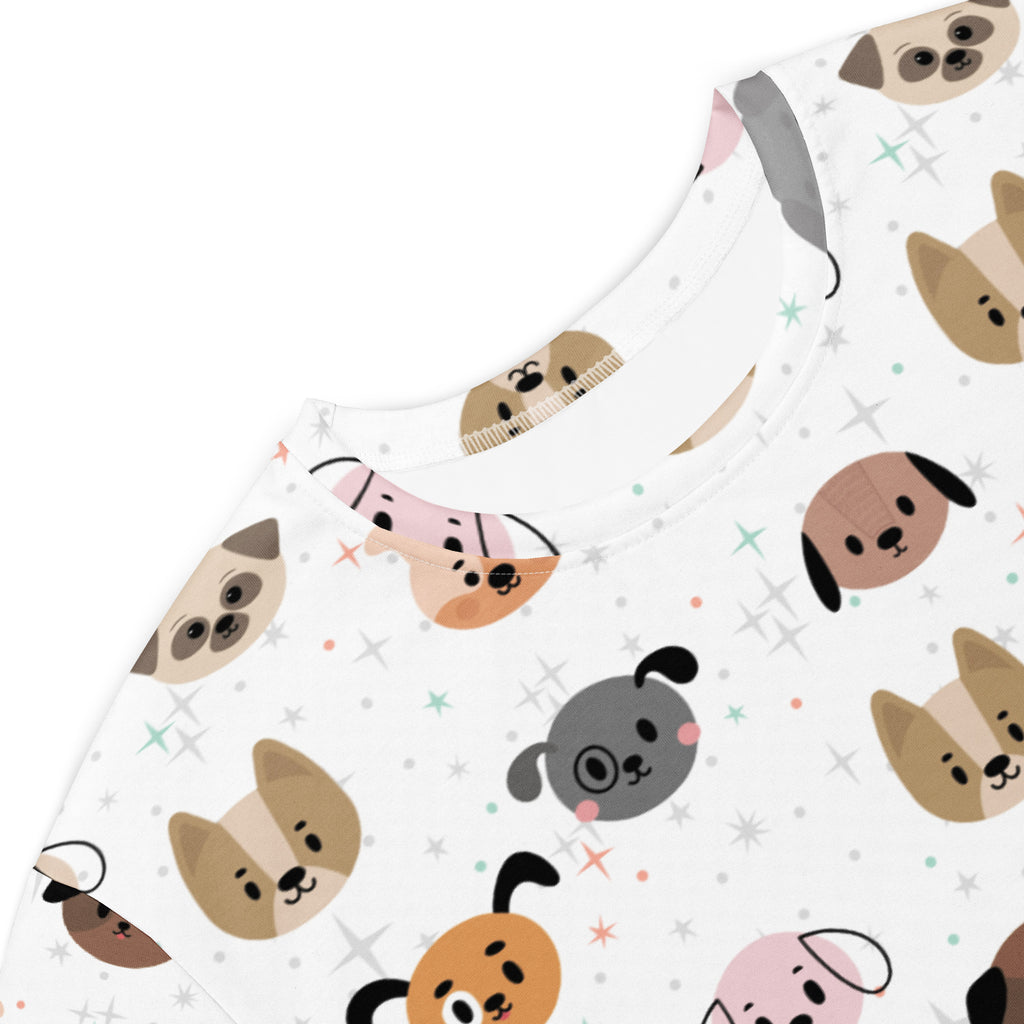 Women’s white t-shirt dress featuring playful cartoon dog pattern in beige brown gray and pink with star accents