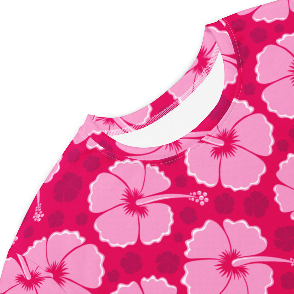 Women’s tropical pink hibiscus t-shirt dress with vibrant pink pattern, bold white outlines, and darker pink accents
