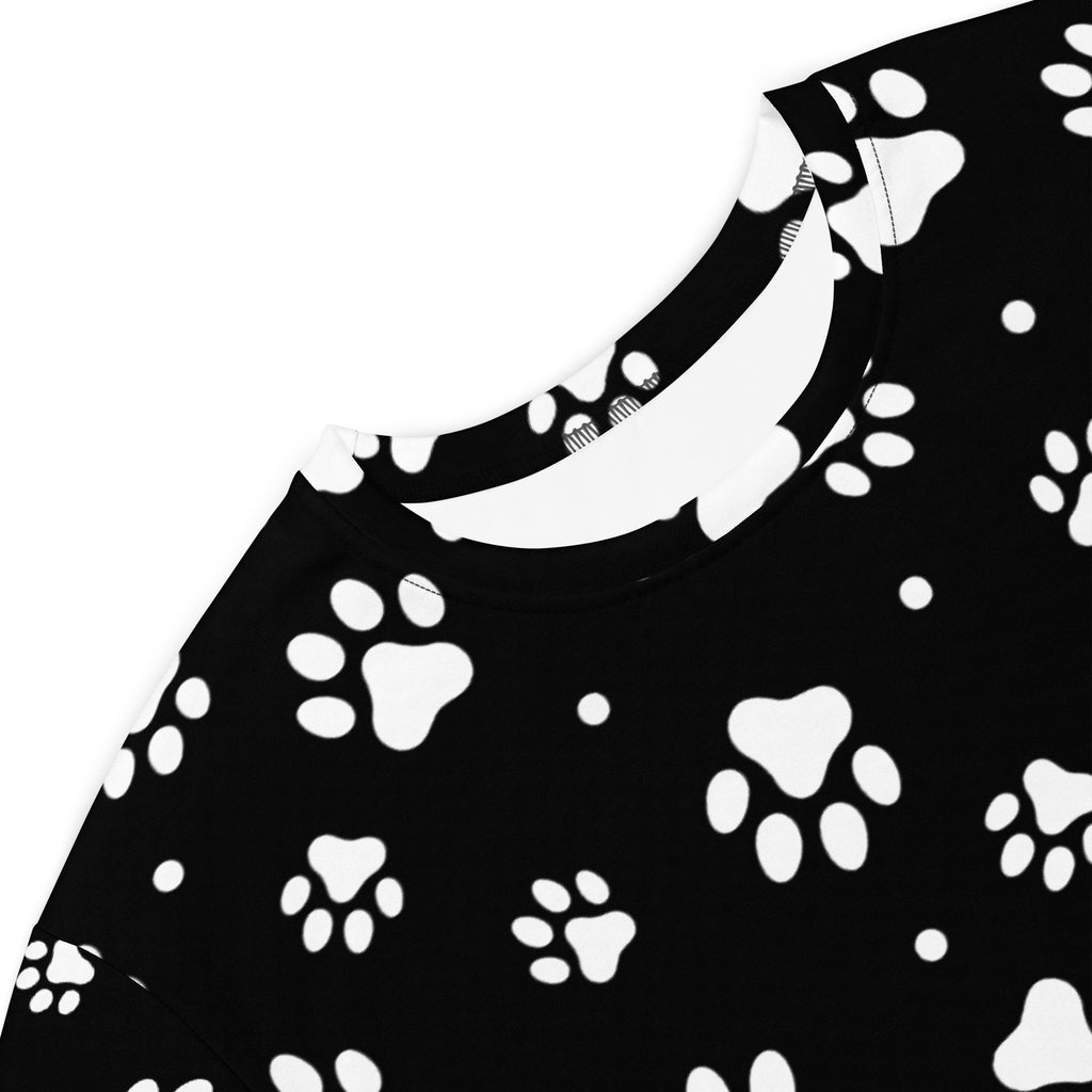Black short-sleeved womens t-shirt dress with white paw print pattern made from soft comfortable fabric