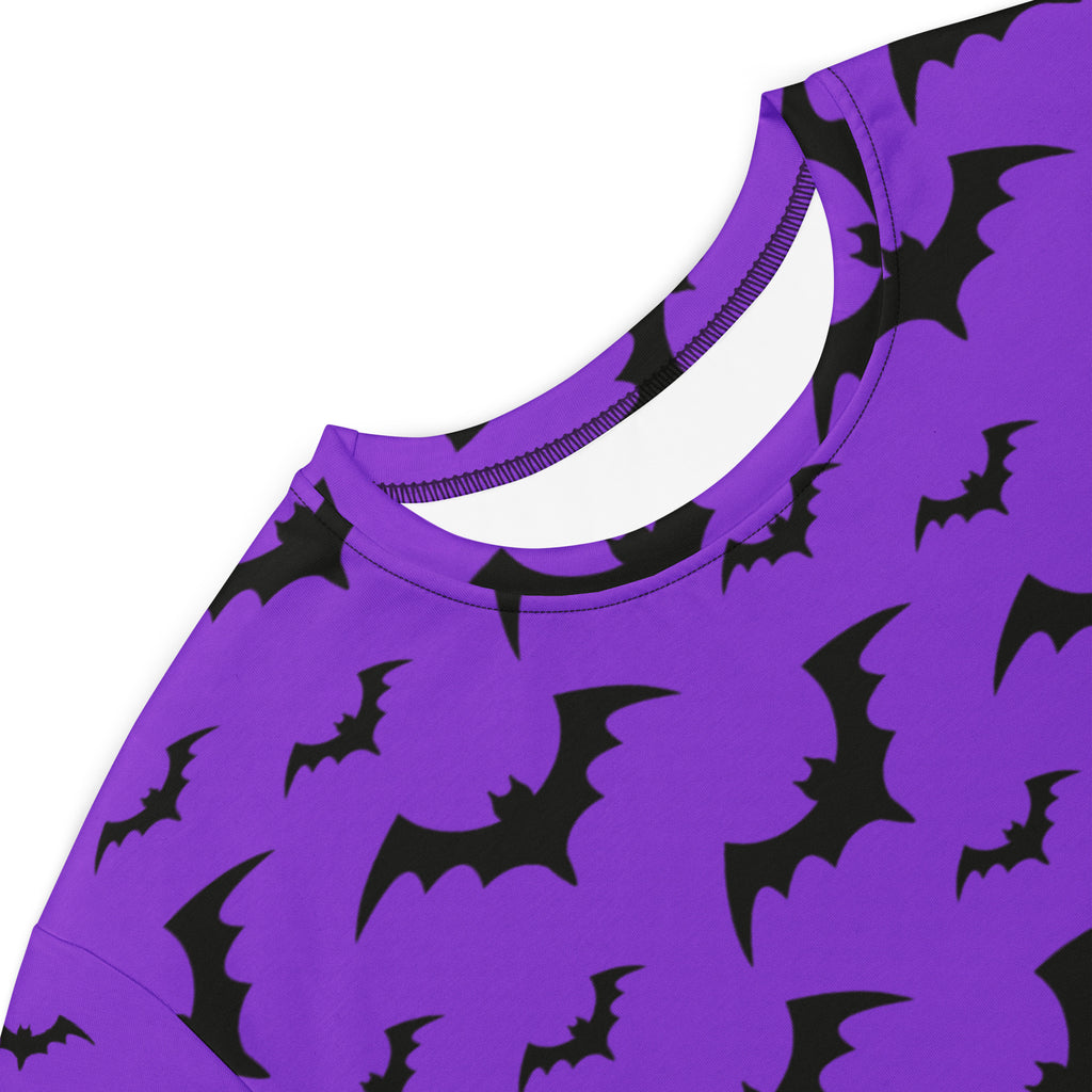Women’s purple halloween t-shirt dress featuring a black bat pattern perfect for festive fall wear