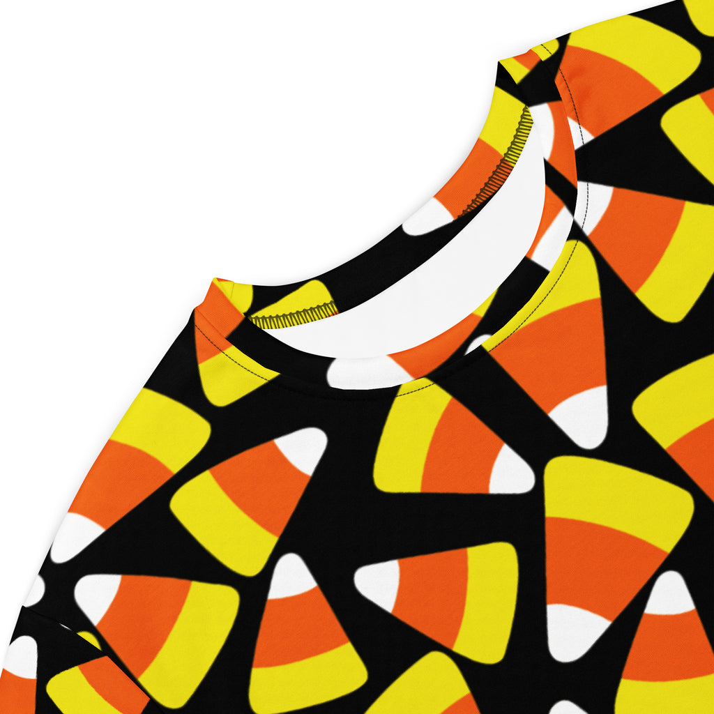 Women’s black short-sleeved t-shirt dress with vibrant orange yellow and white candy corn pattern for halloween