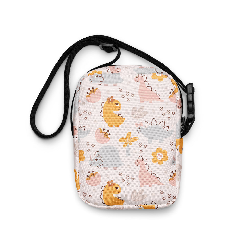 Girls floral dinosaur crossbody purse in white with pastel yellow pink gray cartoon dinosaurs flowers and eggs pattern