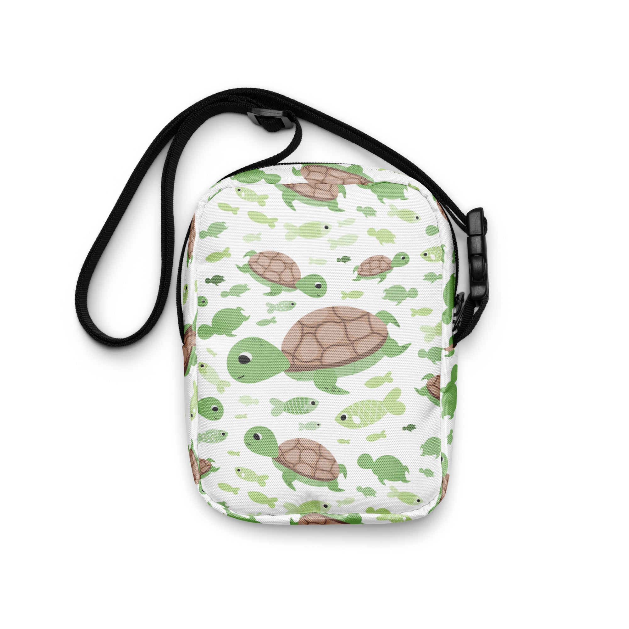 Girls green sea turtle crossbody purse white bag with playful green and brown turtle pattern and black adjustable straps