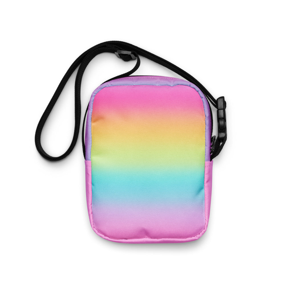 Girls bright rainbow crossbody purse with a vibrant rainbow gradient soft fabric body and black adjustable strap