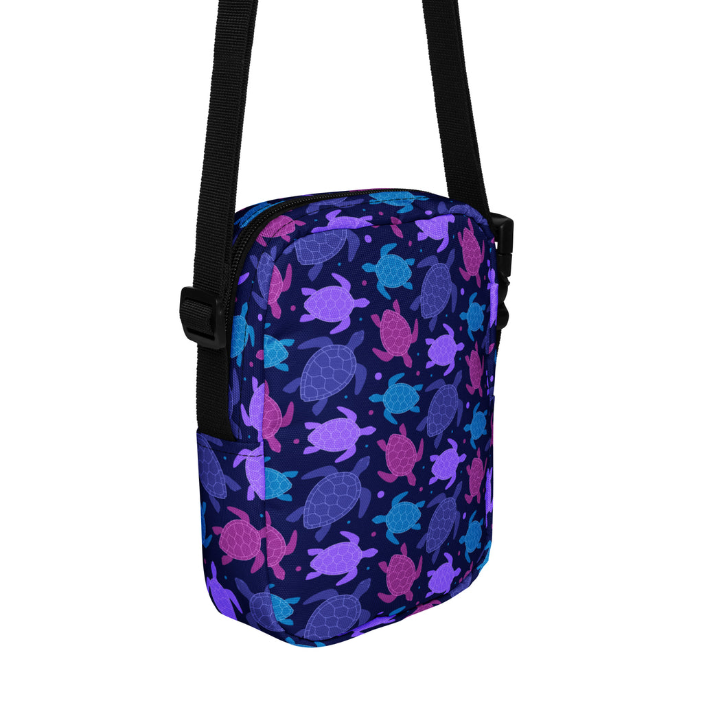 Girls purple sea turtle crossbody purse in navy blue with vibrant purple pink and teal sea turtle pattern