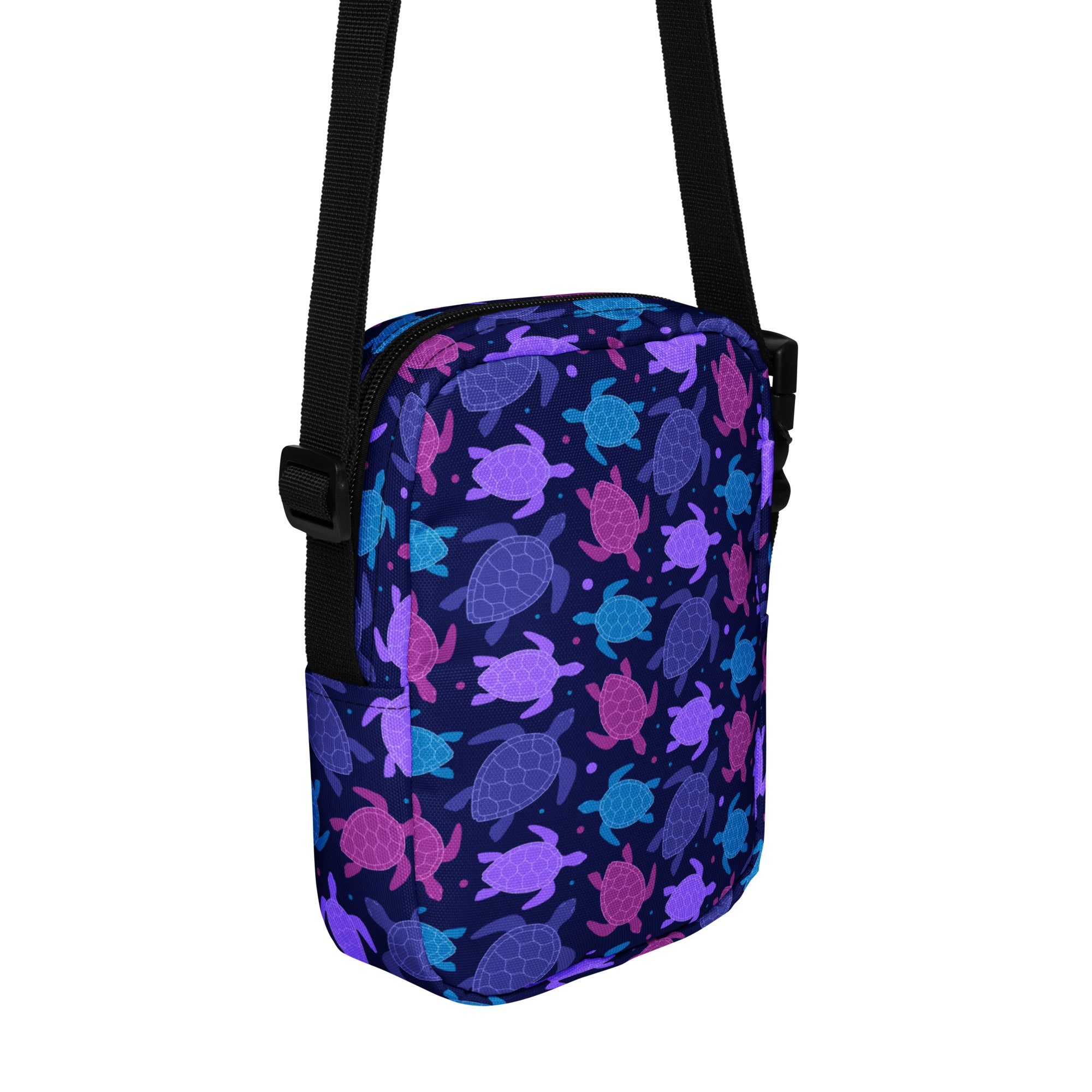 Girls purple sea turtle crossbody purse in navy blue with vibrant purple pink and teal sea turtle pattern