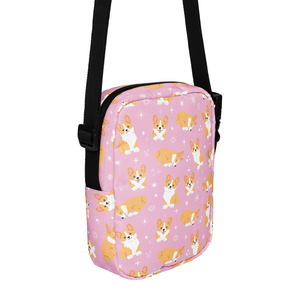 Girls pink corgi crossbody purse with playful orange and white corgi pattern sparkling star accents and black straps