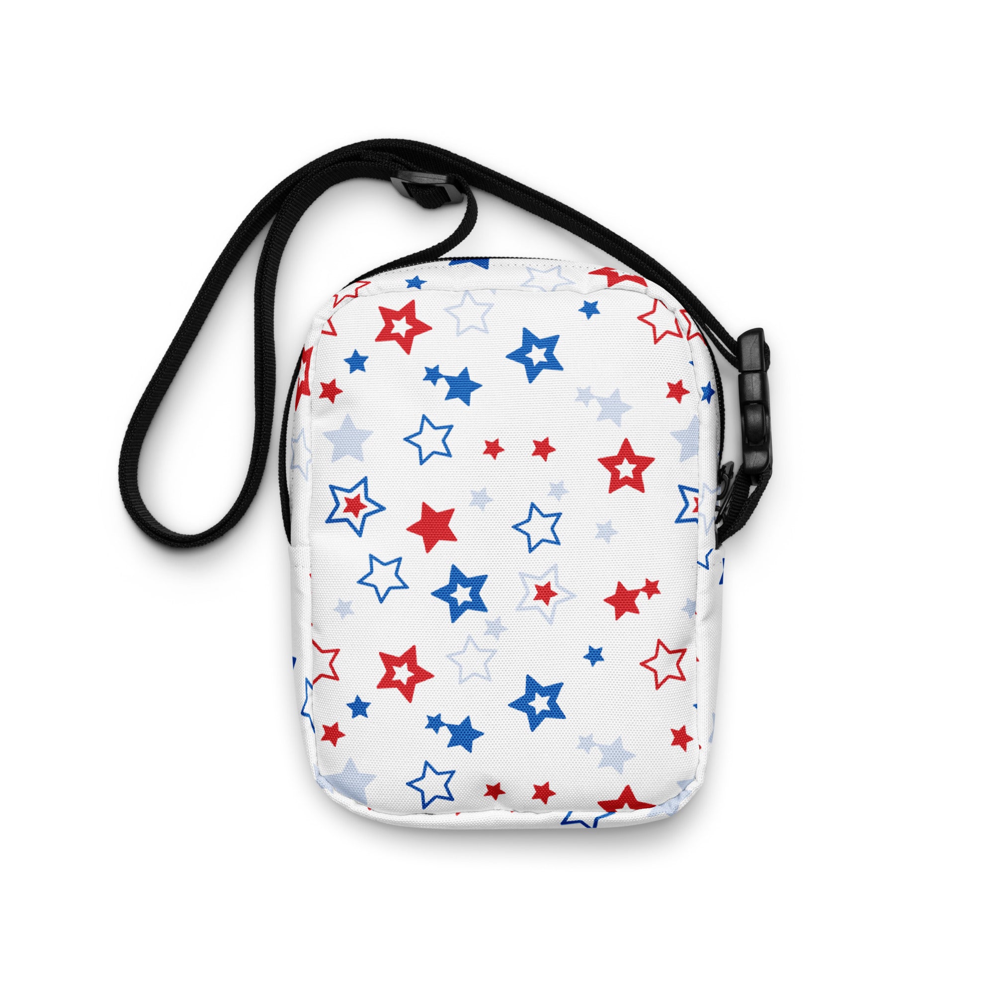 Girls red white and blue stars crossbody purse in white with a playful pattern of red blue and light gray stars