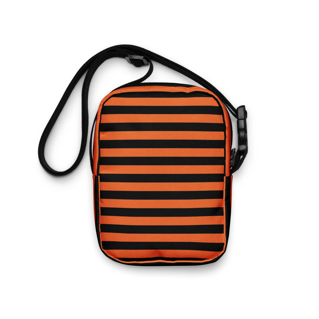Girls orange and black striped halloween crossbody purse with black adjustable strap for easy carrying
