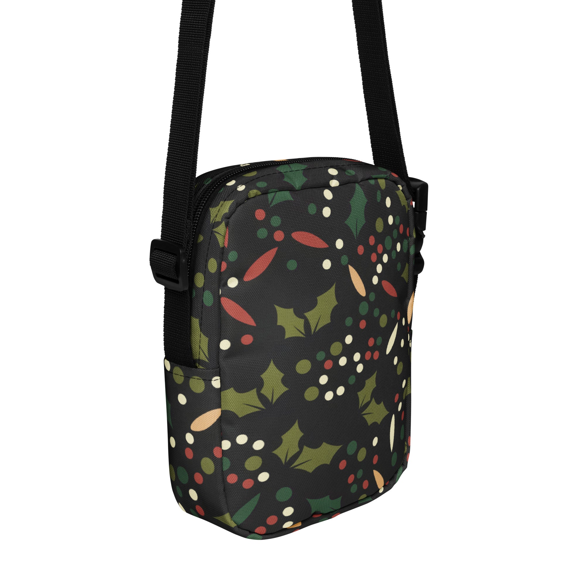 Black girls crossbody purse with festive green holly leaves red and white berries pattern for Christmas use