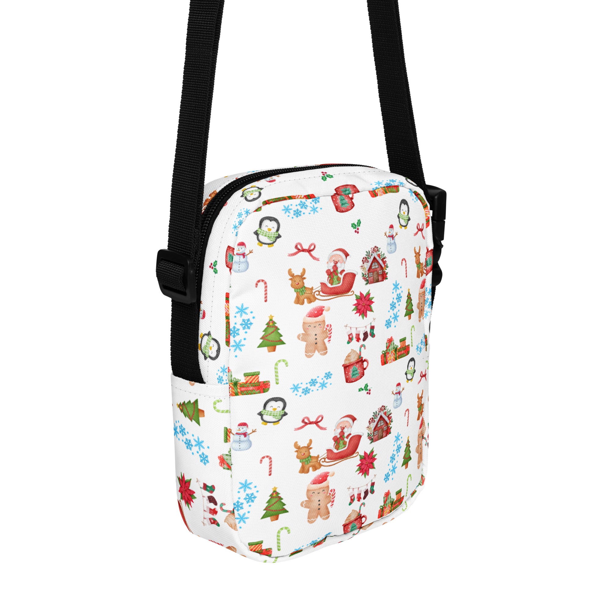 White girls christmas crossbody purse with festive penguins santa reindeer gingerbread candy cane print on fabric