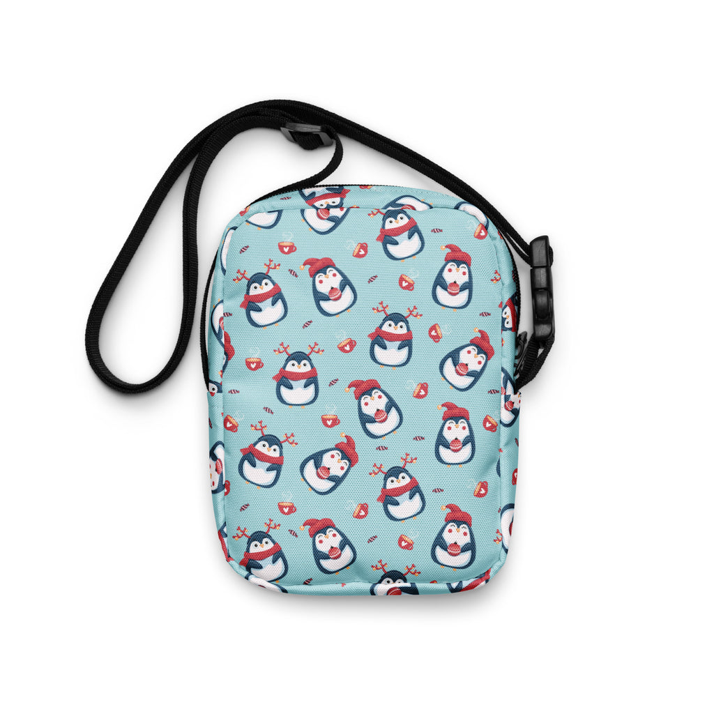 Girls reindeer penguin crossbody purse light blue with playful cartoon penguins red hats scarves hearts and candy canes