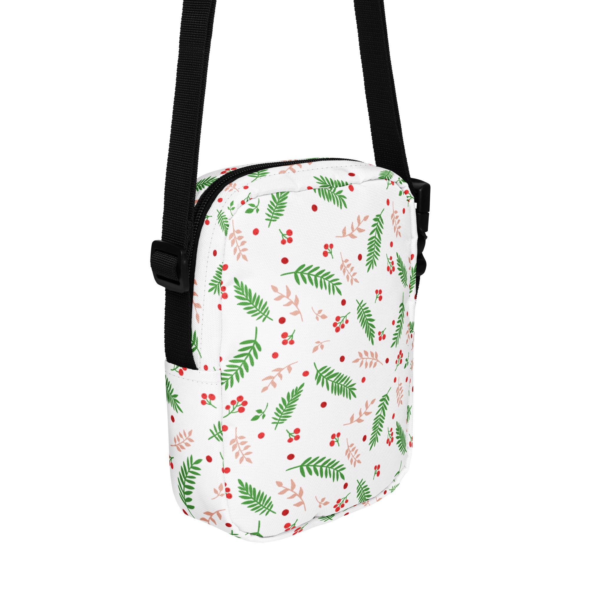 Girls winter greenery and red berries white crossbody purse with green and blush pink fern pattern and black straps