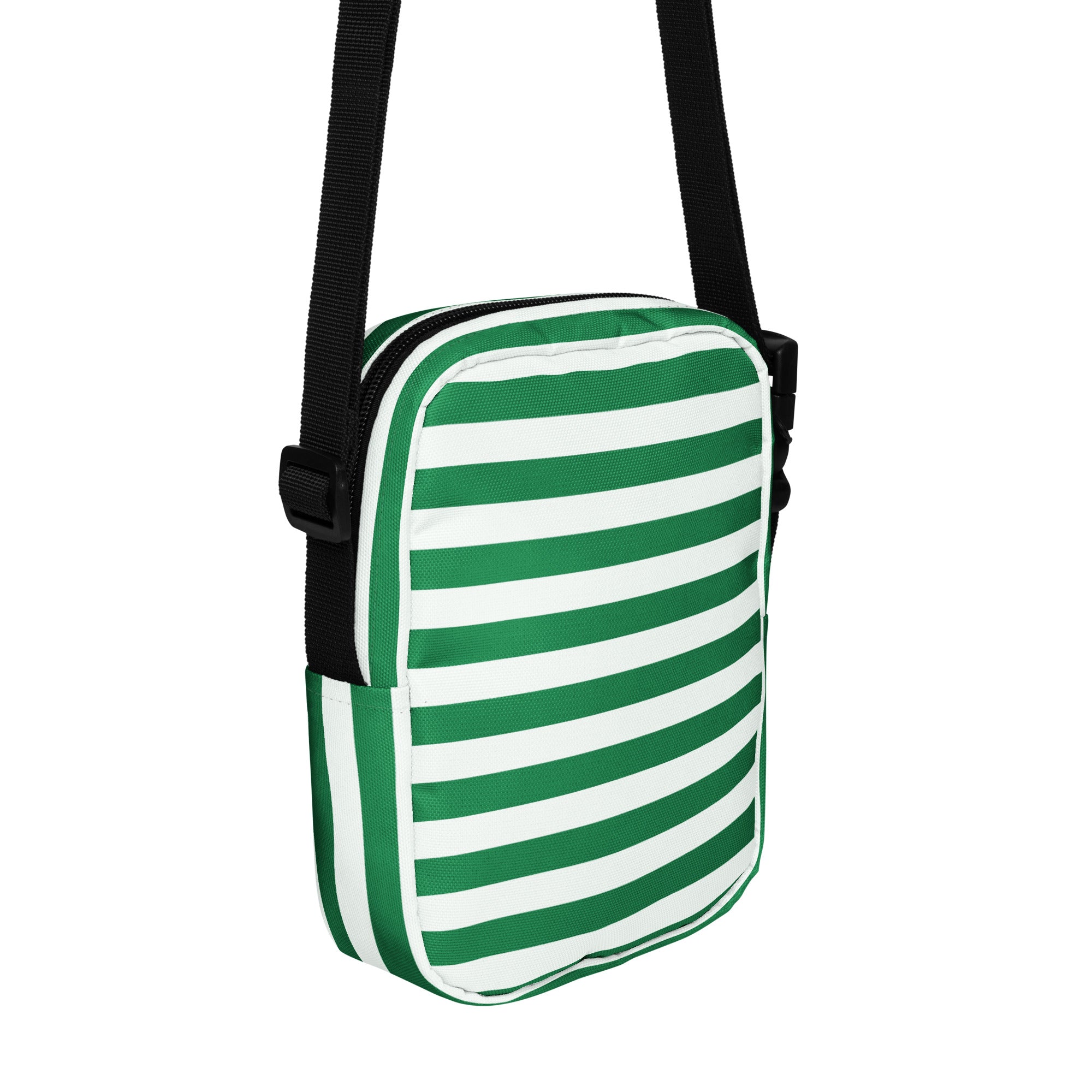 Girls green and white striped crossbody purse with black adjustable strap for hands-free carrying