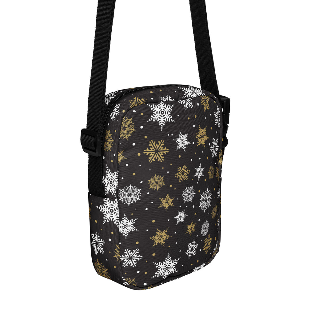 Girls black leather crossbody purse with white and gold snowflake pattern ideal for festive occasions