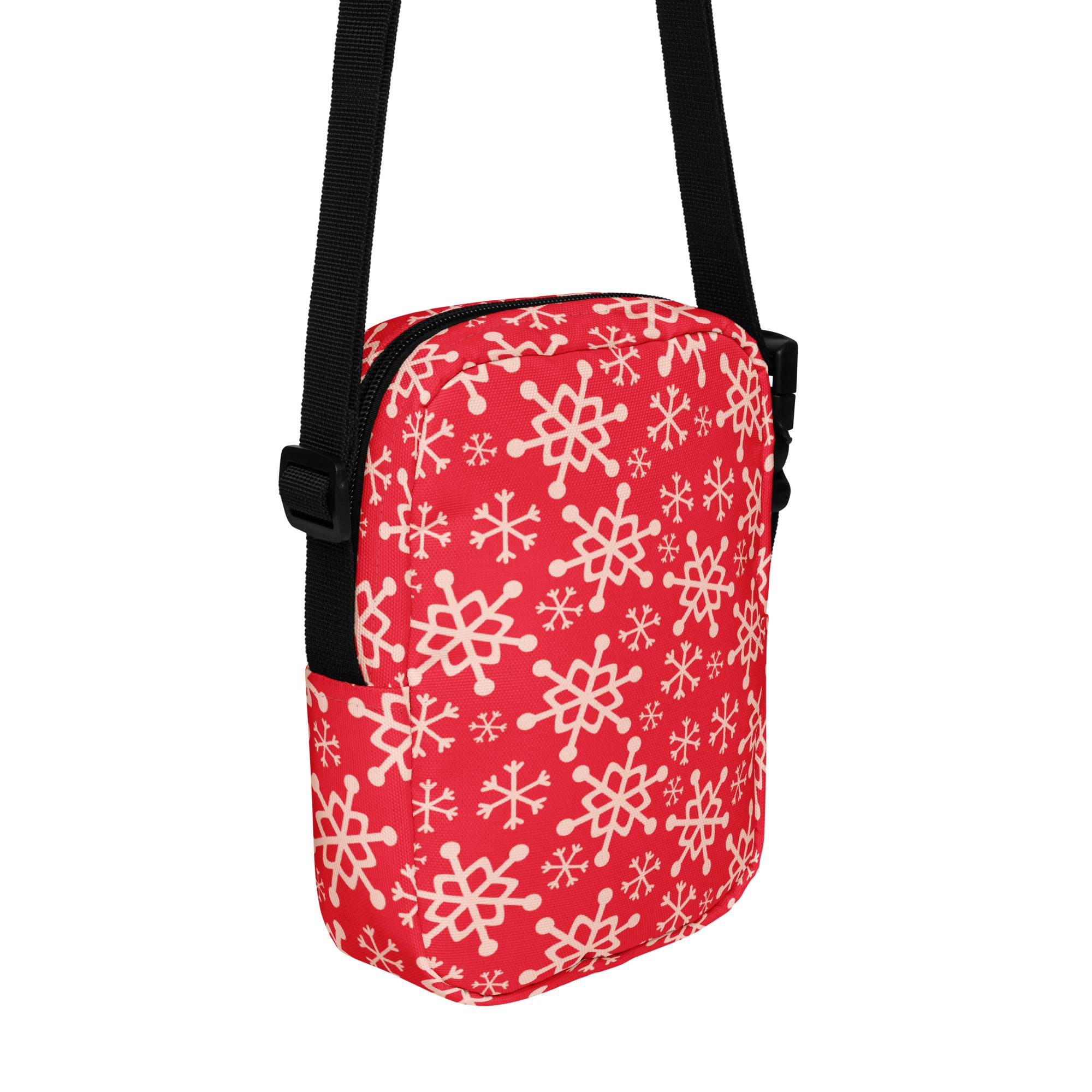 Girls red snowflakes crossbody purse with white snowflake pattern and black adjustable strap for everyday use