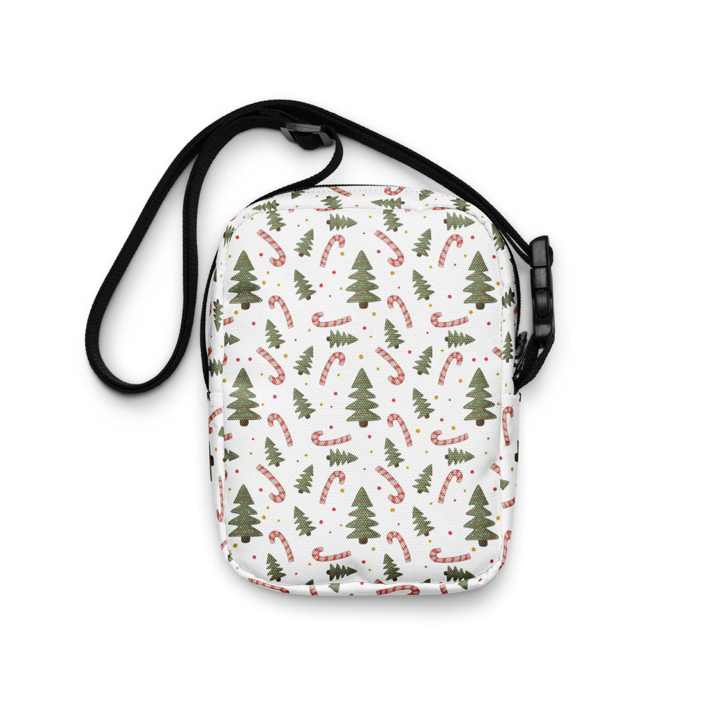 White crossbody bag for girls with festive green pine trees and red and white candy canes pattern for christmas