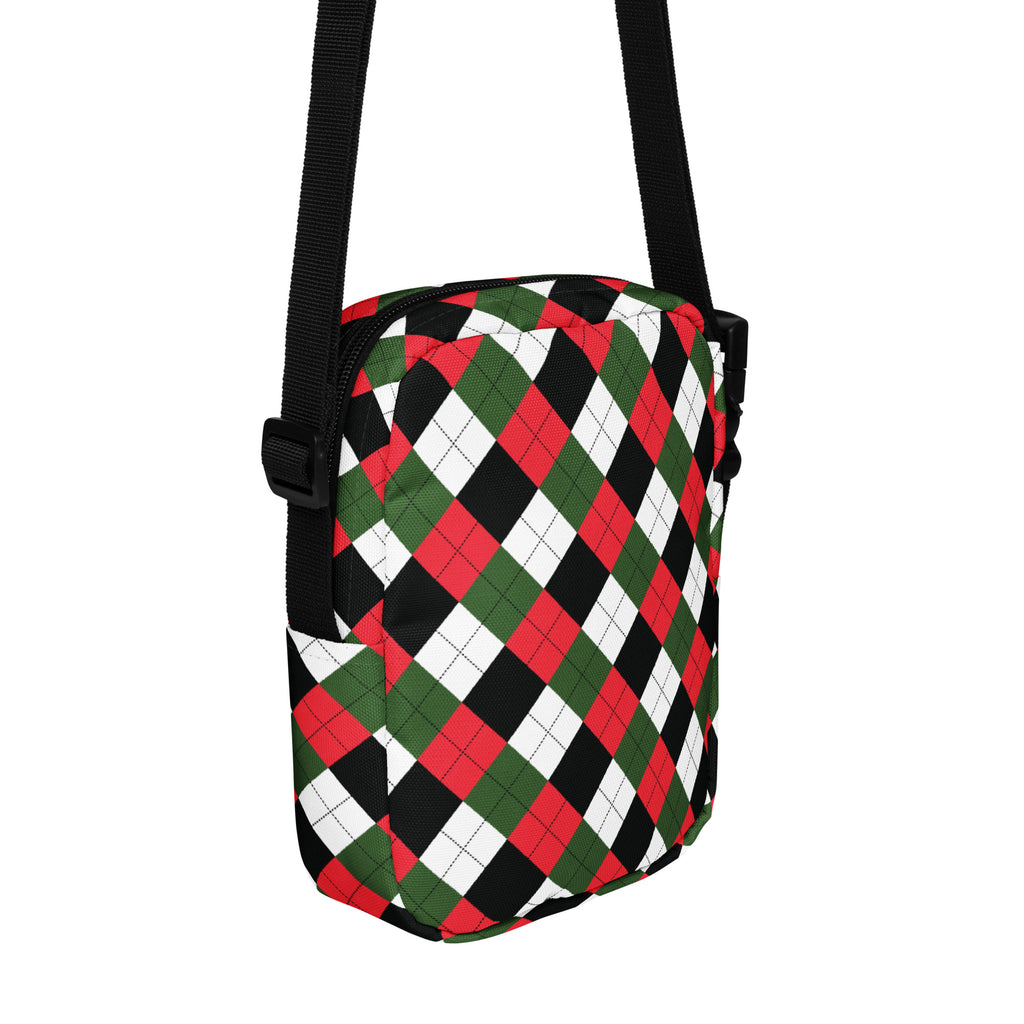 Girls christmas argyle crossbody purse with festive red green and black pattern and black adjustable strap
