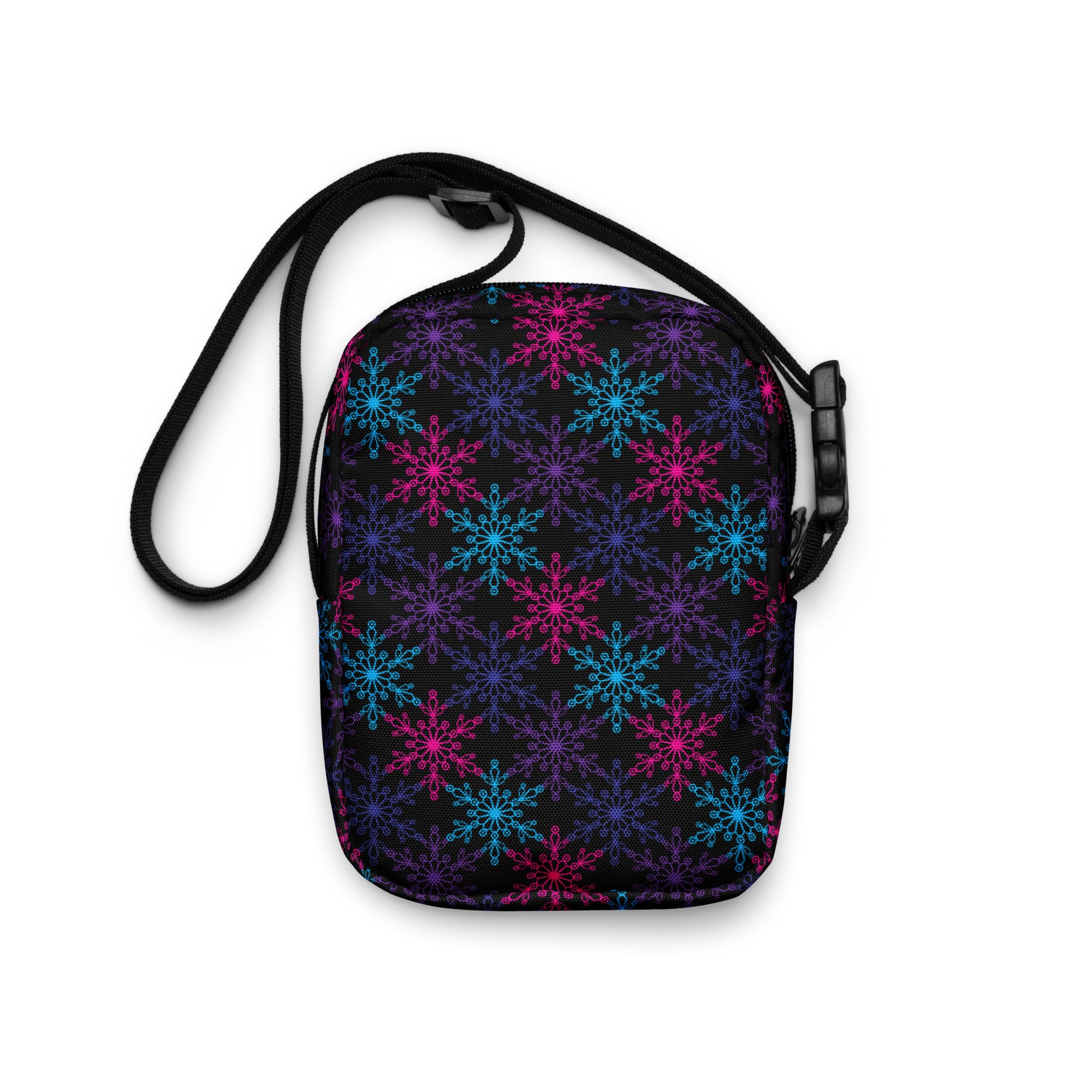 A black girls neon snowflakes crossbody purse with vibrant pink blue and purple snowflake patterns