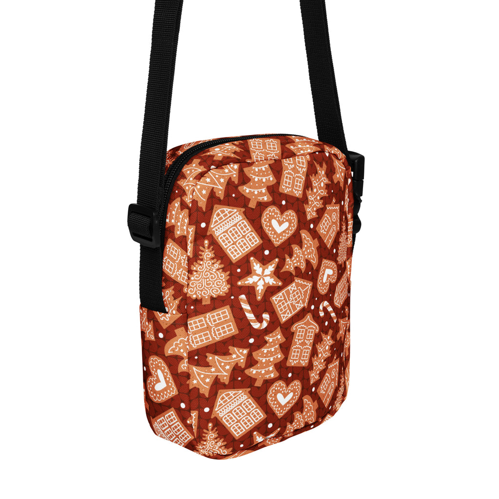 A festive brown crossbody bag with gingerbread house candy cane pattern in beige and white for Christmas use