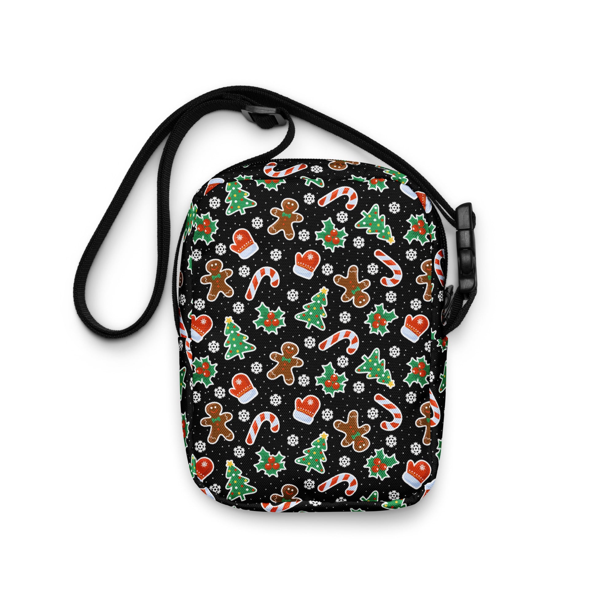 Black girls crossbody bag with festive gingerbread men candy cane christmas tree and mitten pattern