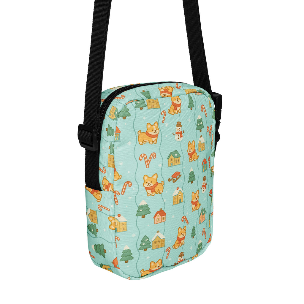 A light blue Shiba Inu Christmas women’s crossbody purse with cartoon corgis candy canes and christmas tree pattern