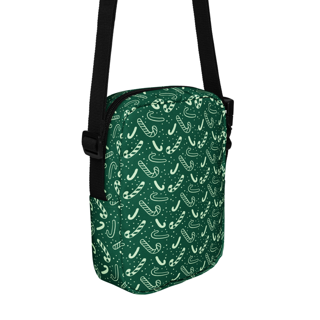 Girls green candy cane patterned crossbody purse with black straps perfect for Christmas and holiday use