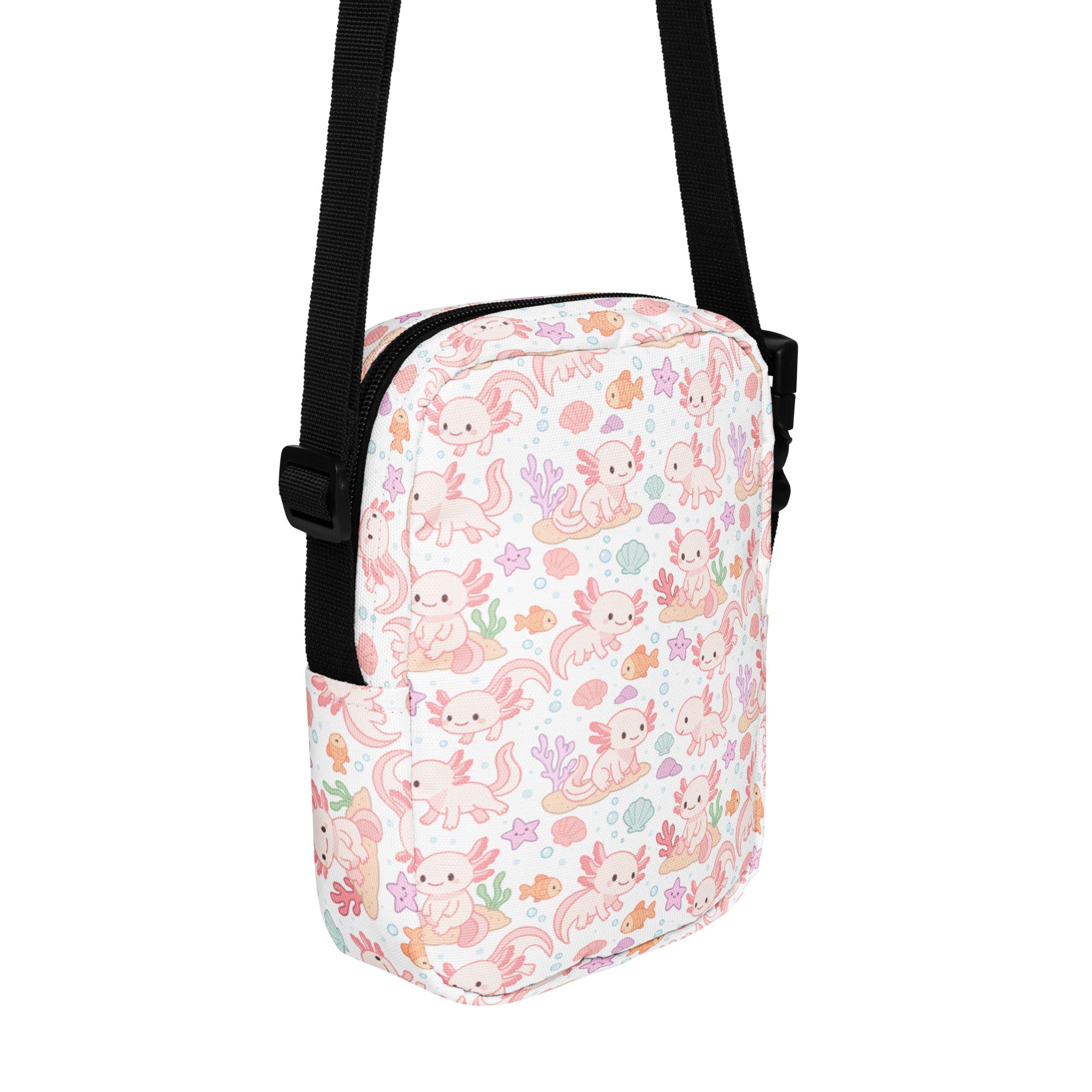Girls axolotl crossbody purse white bag with playful pink axolotls fish and sea creatures pattern on light background