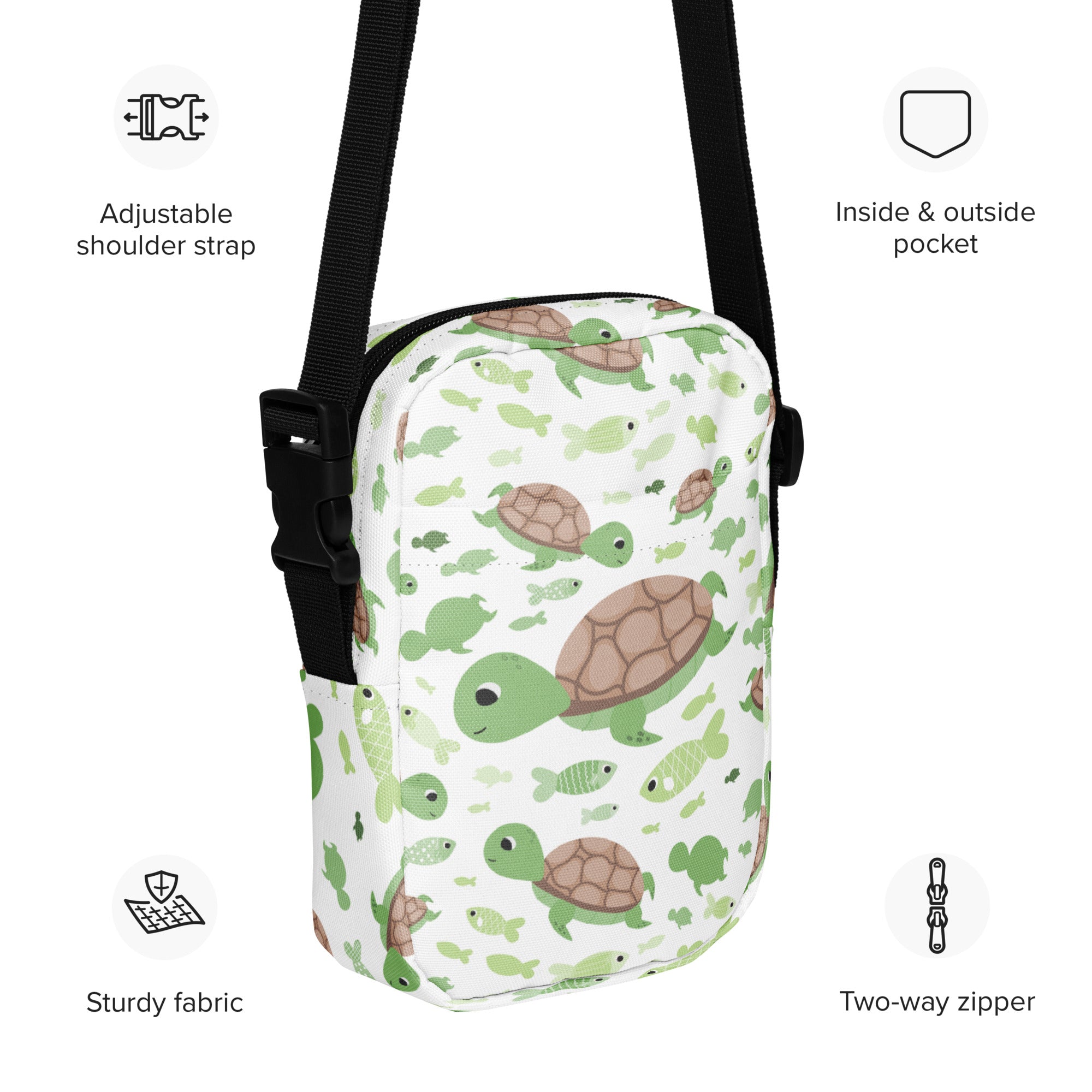 Girls green sea turtle crossbody purse with playful turtle and fish pattern made of sturdy fabric material