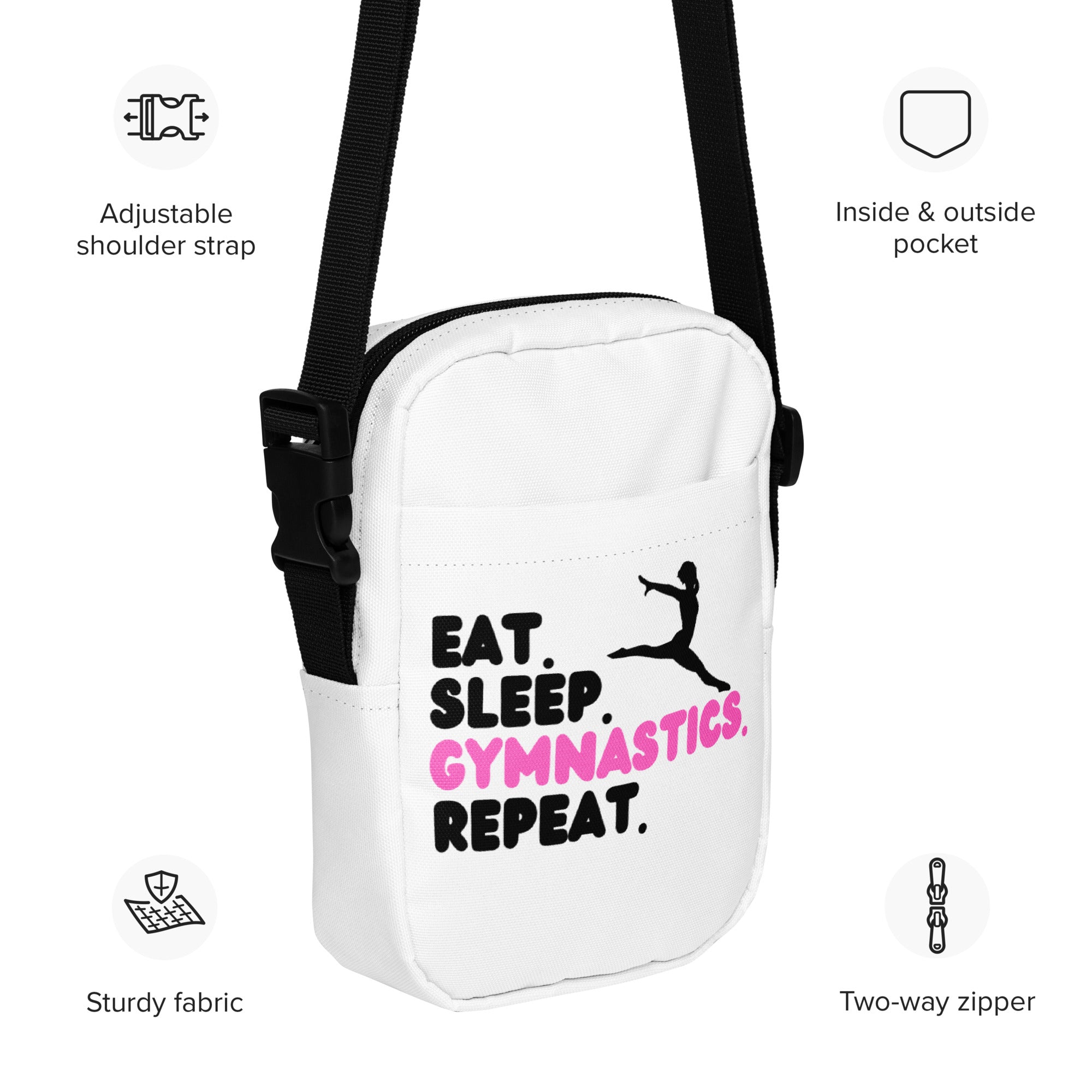 White crossbody bag with black adjustable strap and pink black eat sleep gymnastics repeat design for girls