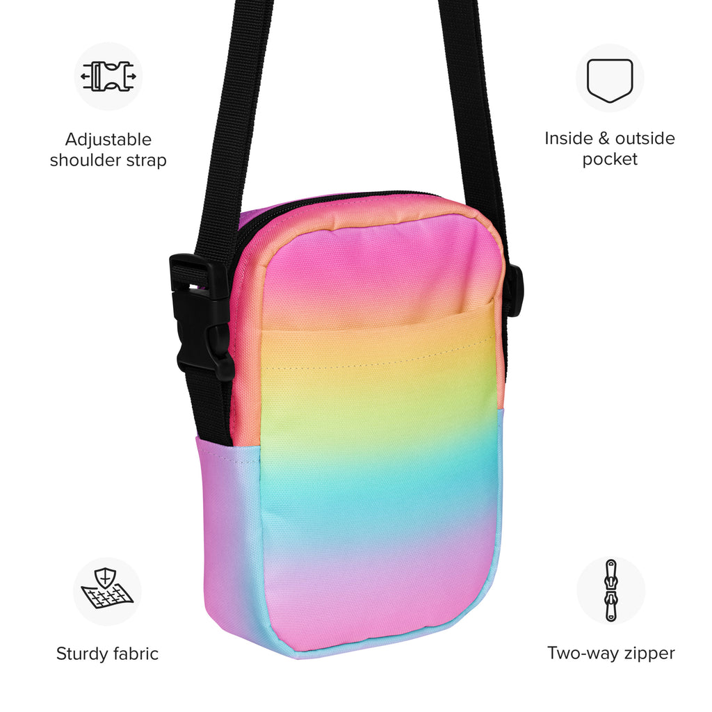 Girls bright rainbow crossbody purse made of gradient fabric with black adjustable strap and two-way zipper closure