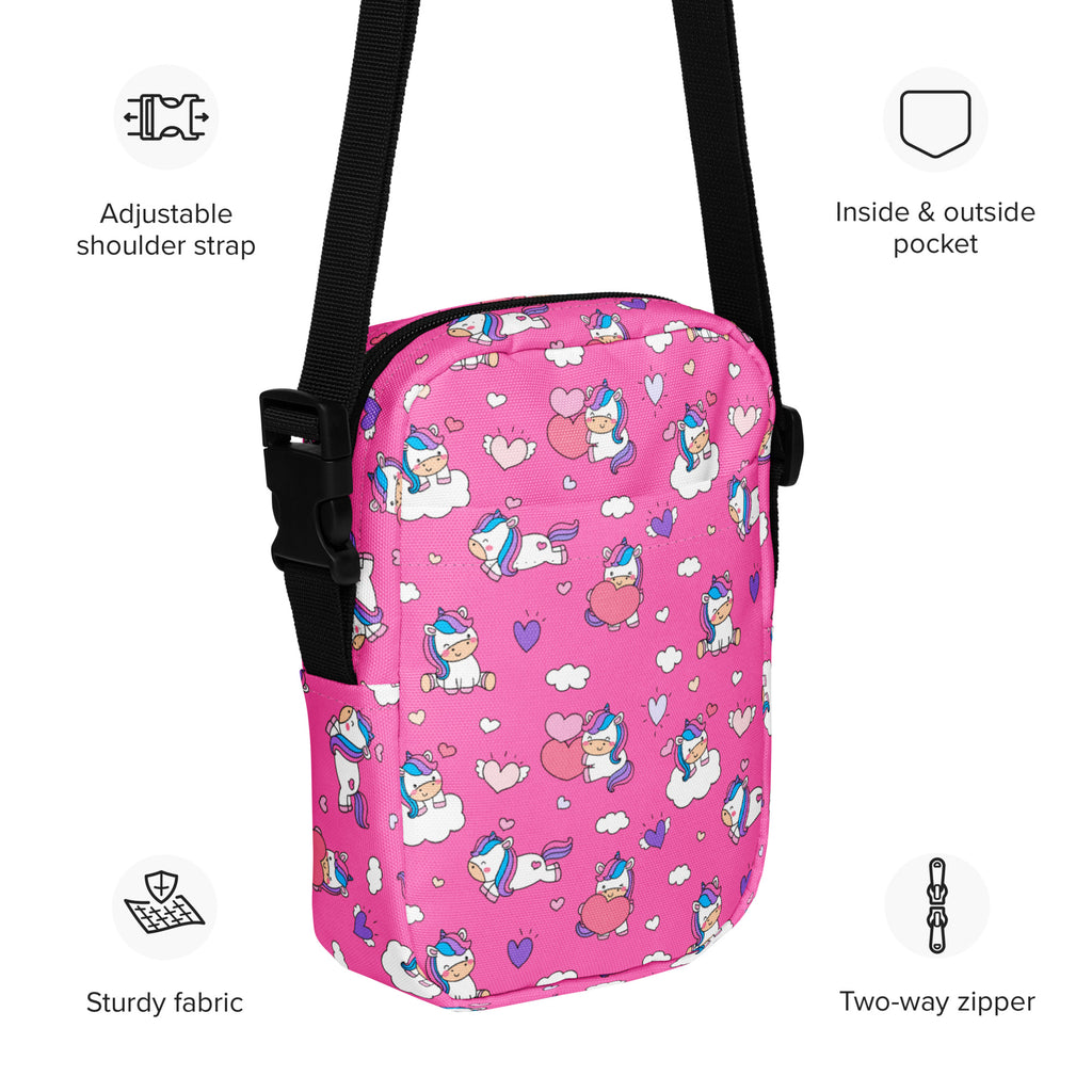Girls pink unicorn crossbody purse with black adjustable strap and two-way zipper for easy access and secure storage