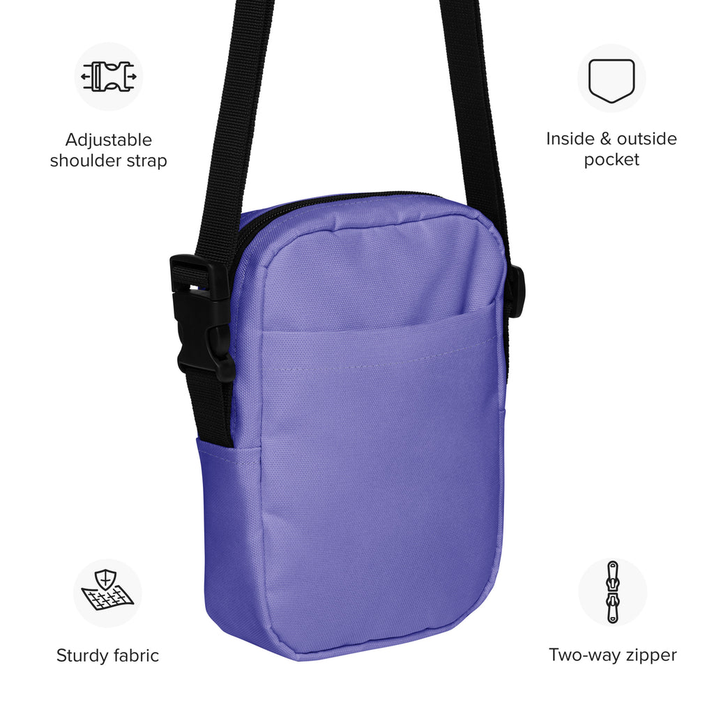 Girls purple crossbody purse with black adjustable strap and two-way zipper for easy access and style