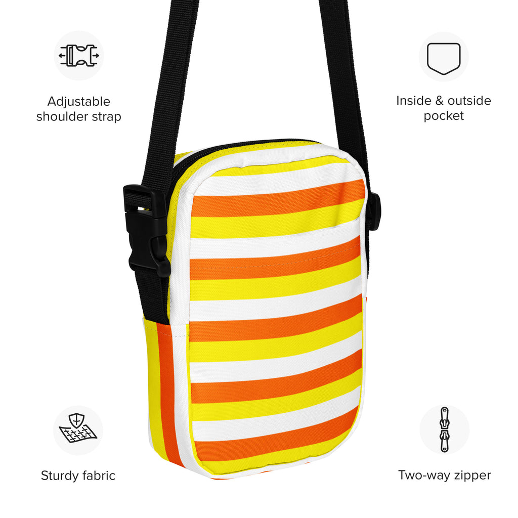 Girls candy corn stripes halloween crossbody purse with bold yellow orange white stripes on sturdy fabric and black straps