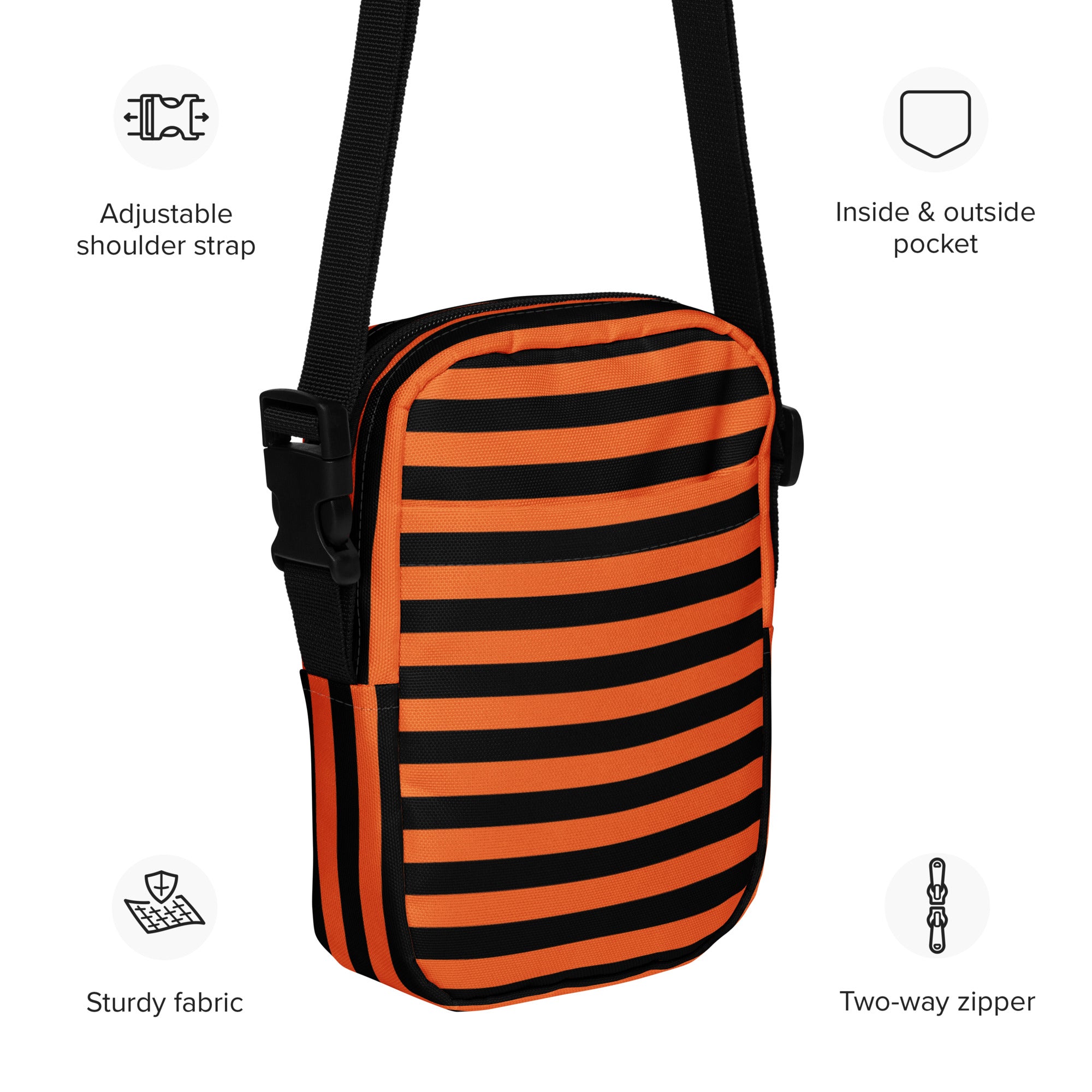 Girls orange and black striped Halloween crossbody purse with adjustable shoulder strap for easy carrying