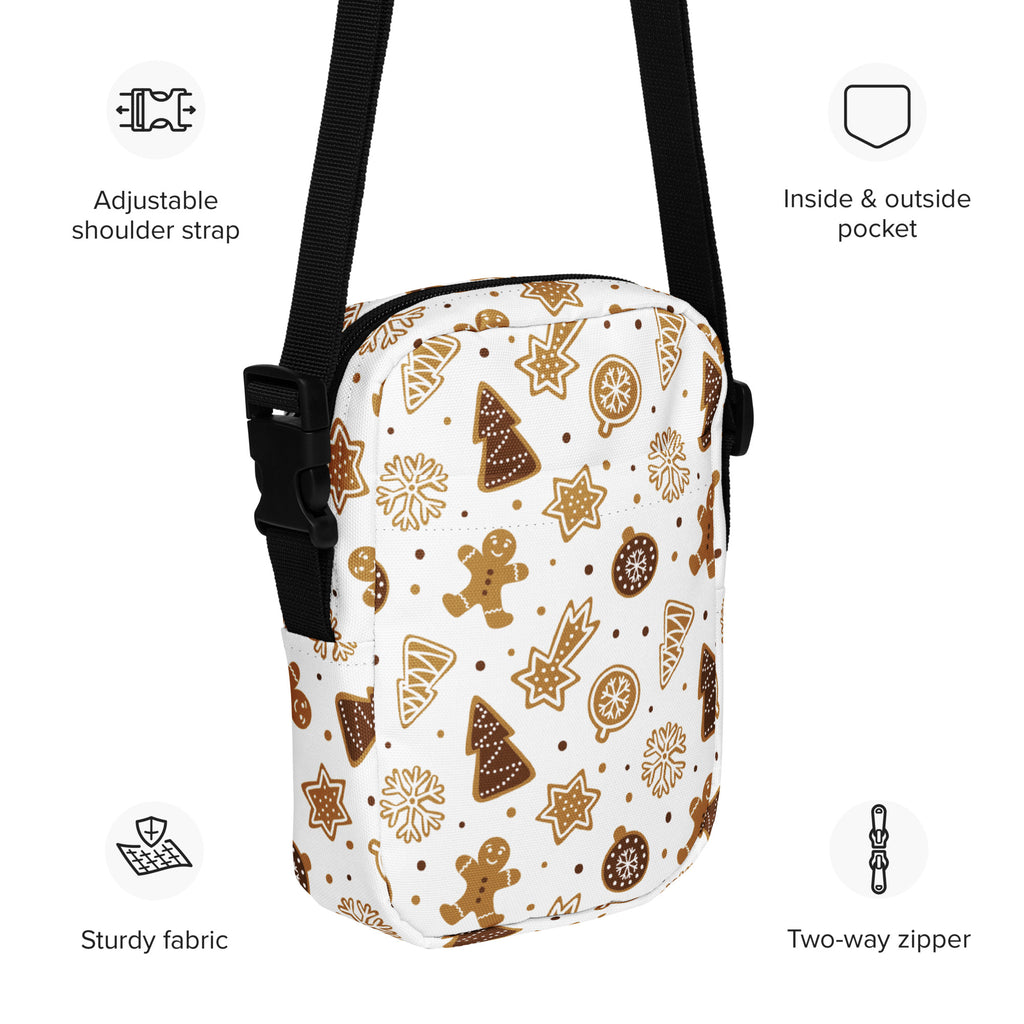 White kids crossbody bag with festive gingerbread cookie pattern in brown and gold and adjustable black strap