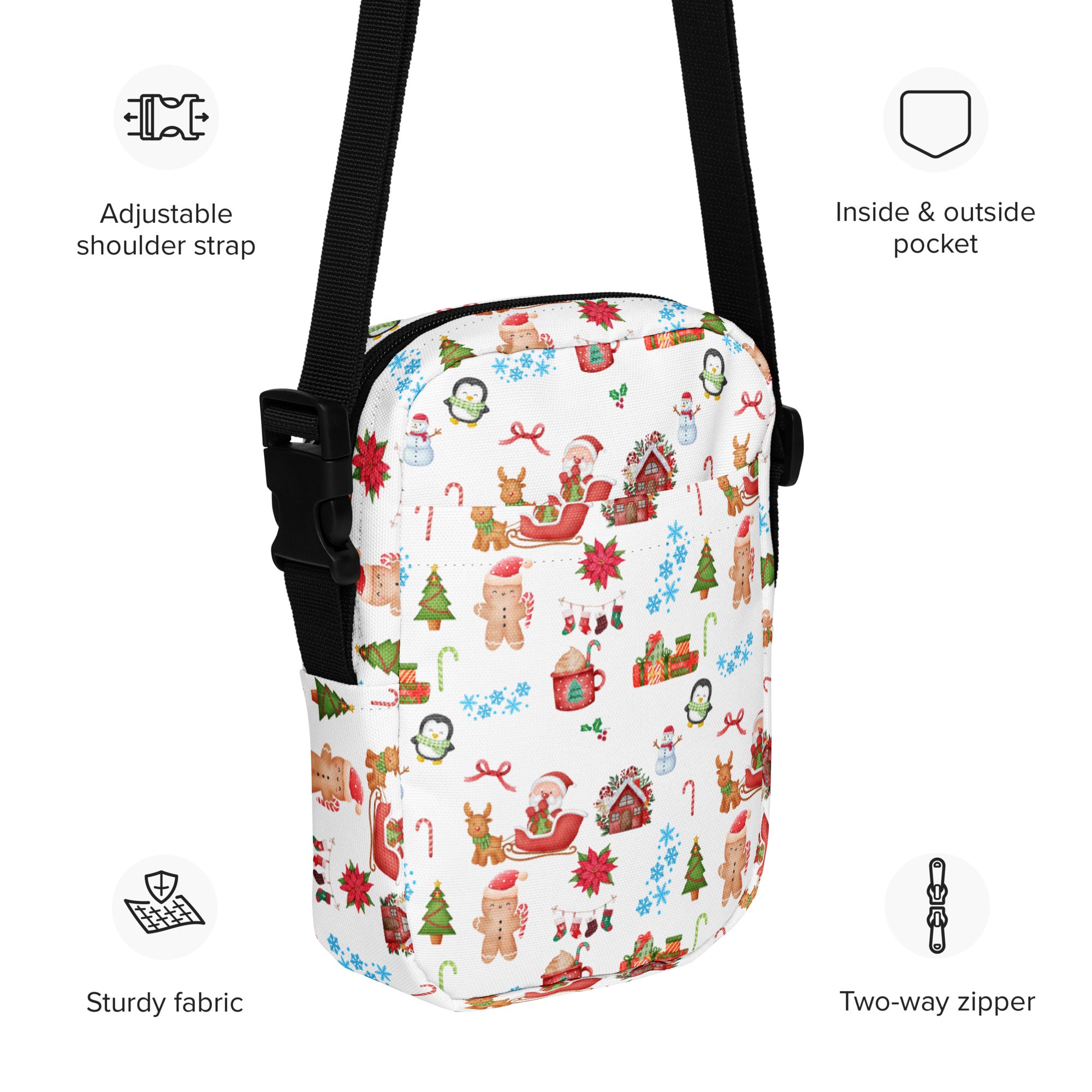 White crossbody bag with festive Christmas print of gingerbread men snowmen reindeer in red green blue and brown