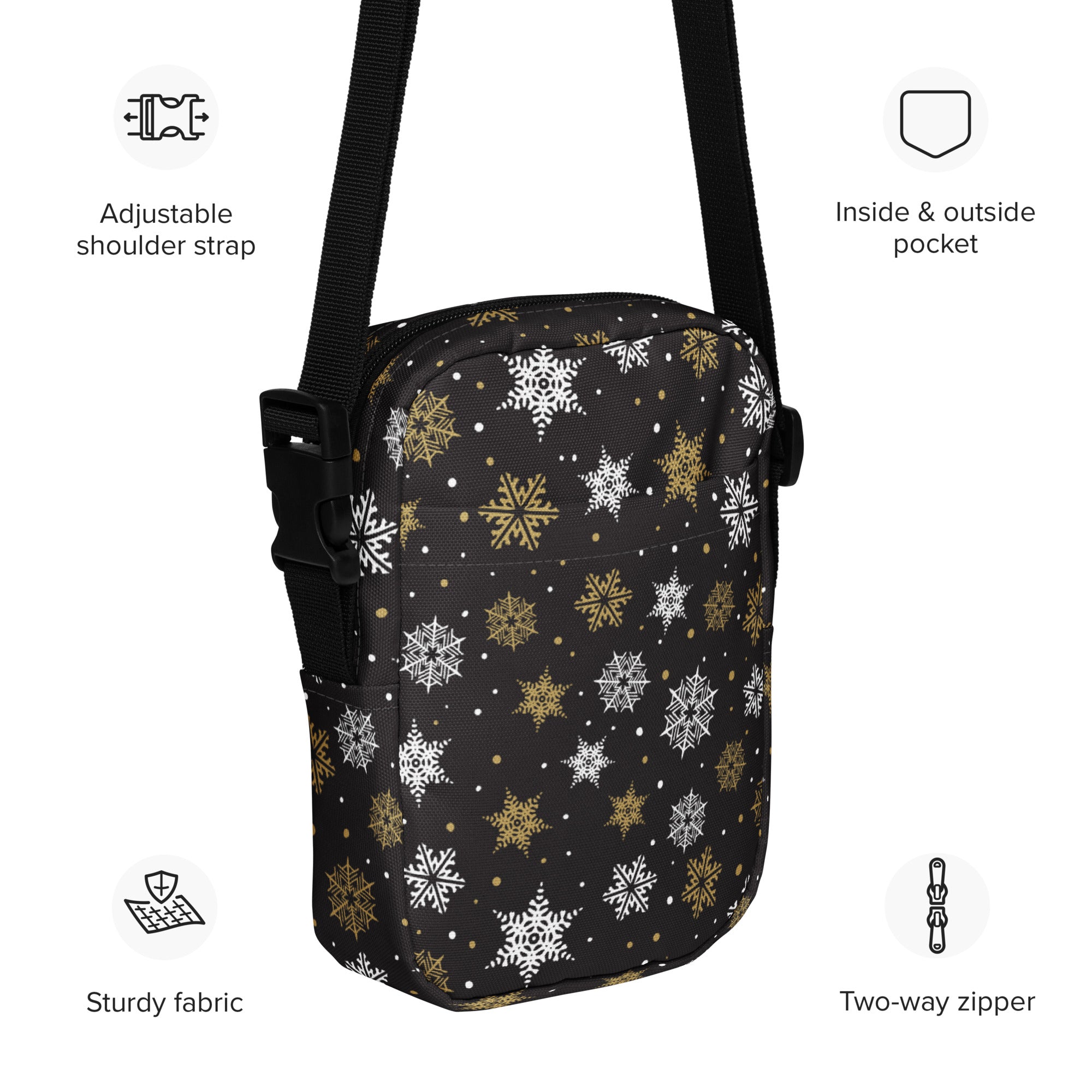 Girls black and gold snowflakes crossbody purse in sturdy fabric with festive white and gold snowflake pattern and adjustable strap