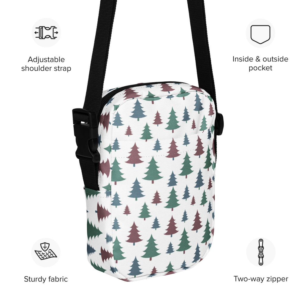 White crossbody bag with green and maroon pastel christmas tree pattern and black adjustable straps for girls