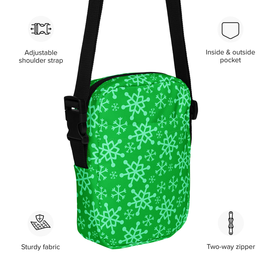Girls green snowflakes crossbody purse with light green snowflake pattern and black adjustable strap