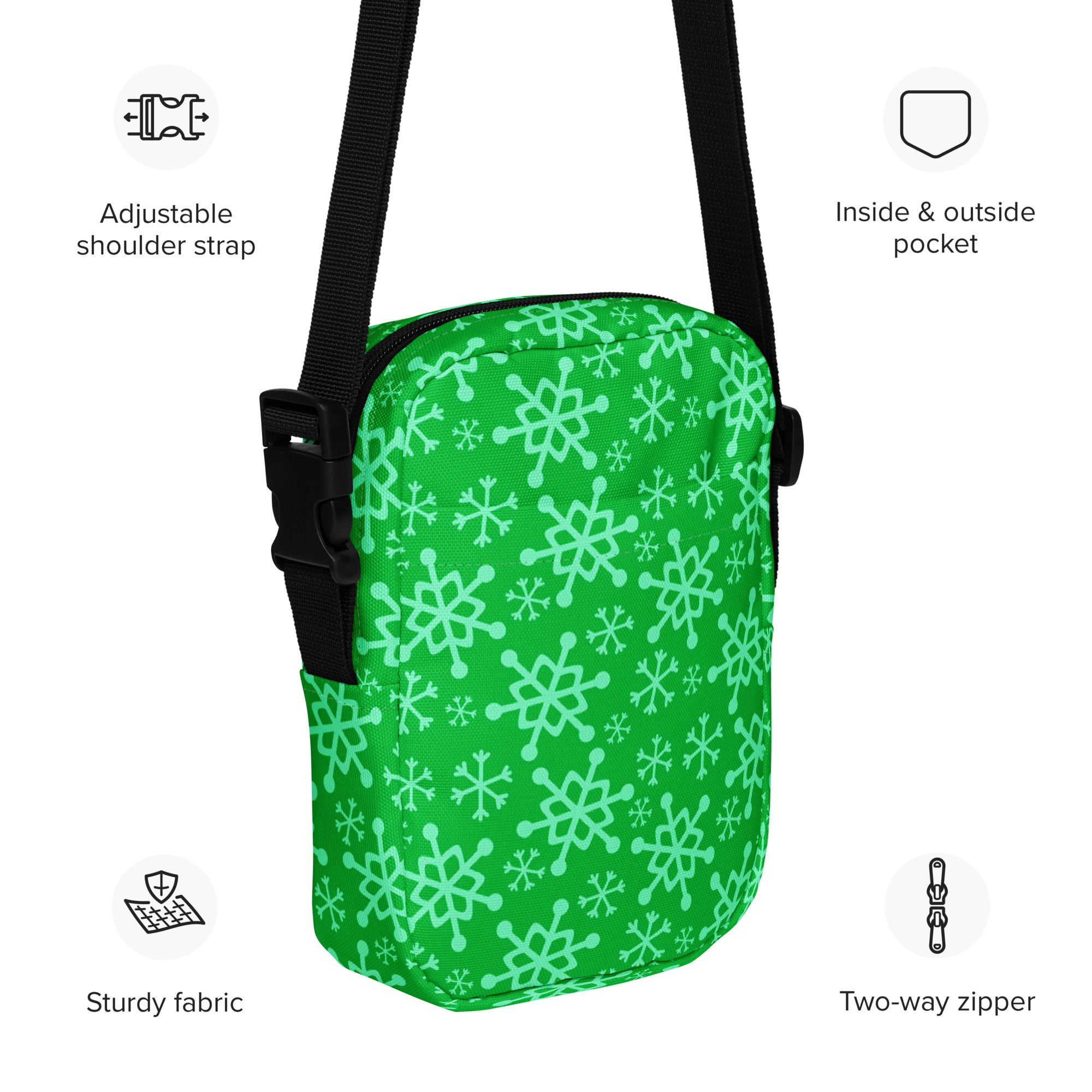 Girls green snowflakes crossbody purse with light green snowflake pattern and black adjustable strap