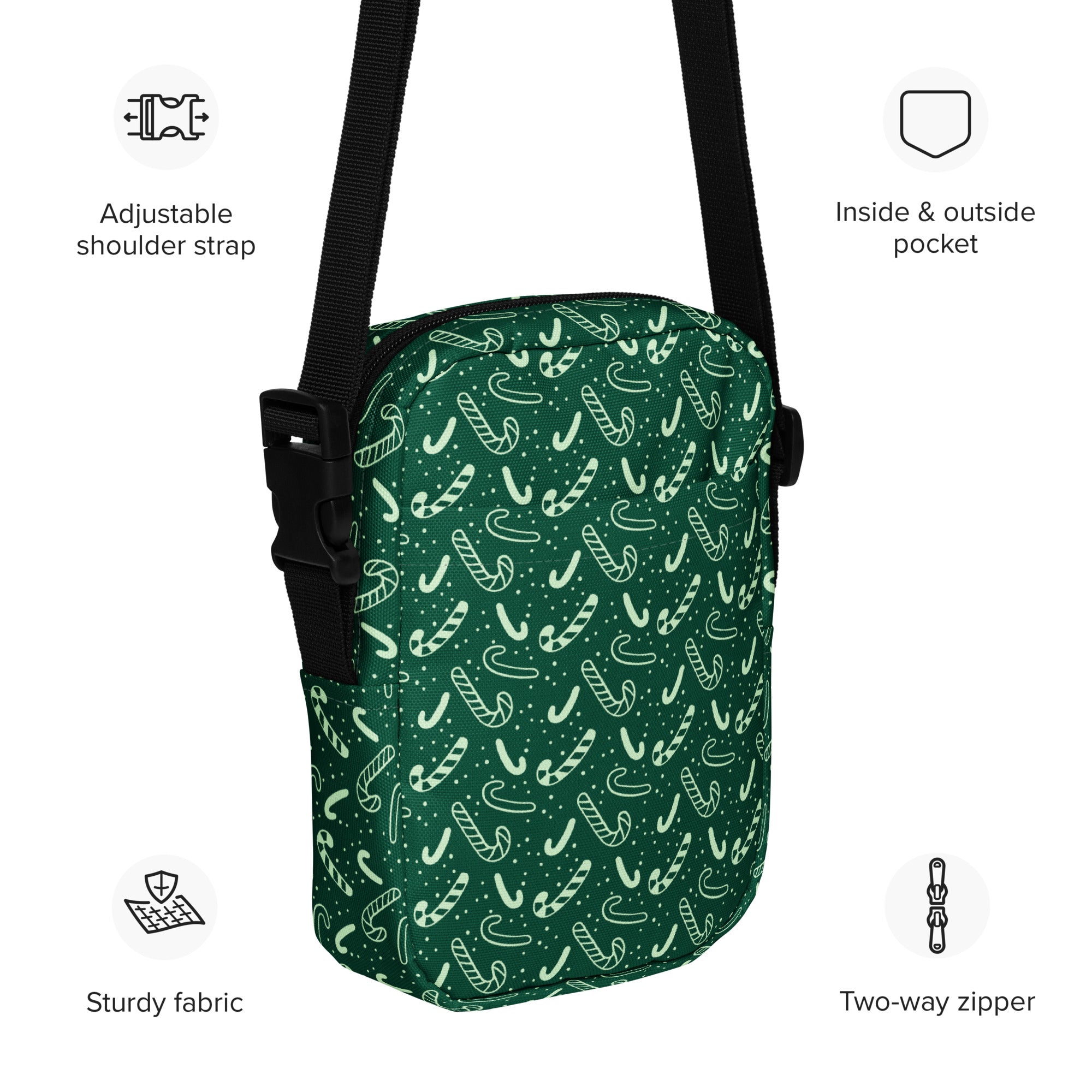 Green candy cane christmas women’s crossbody purse with candy cane pattern black adjustable strap and two way zipper