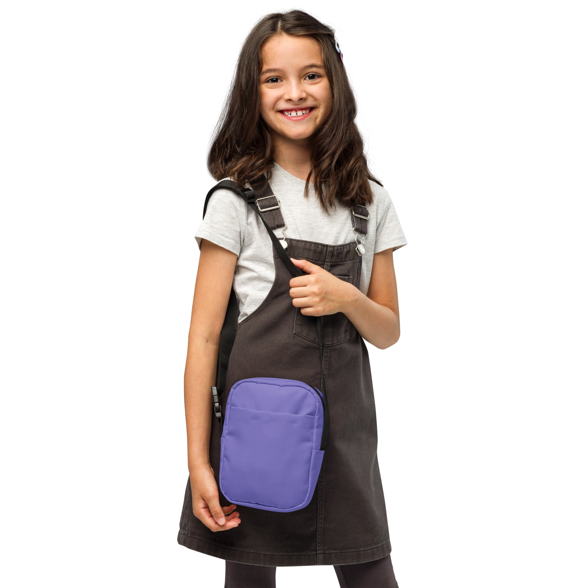 Dark gray denim overalls with a purple rectangular front pocket and girls purple crossbody purse detail