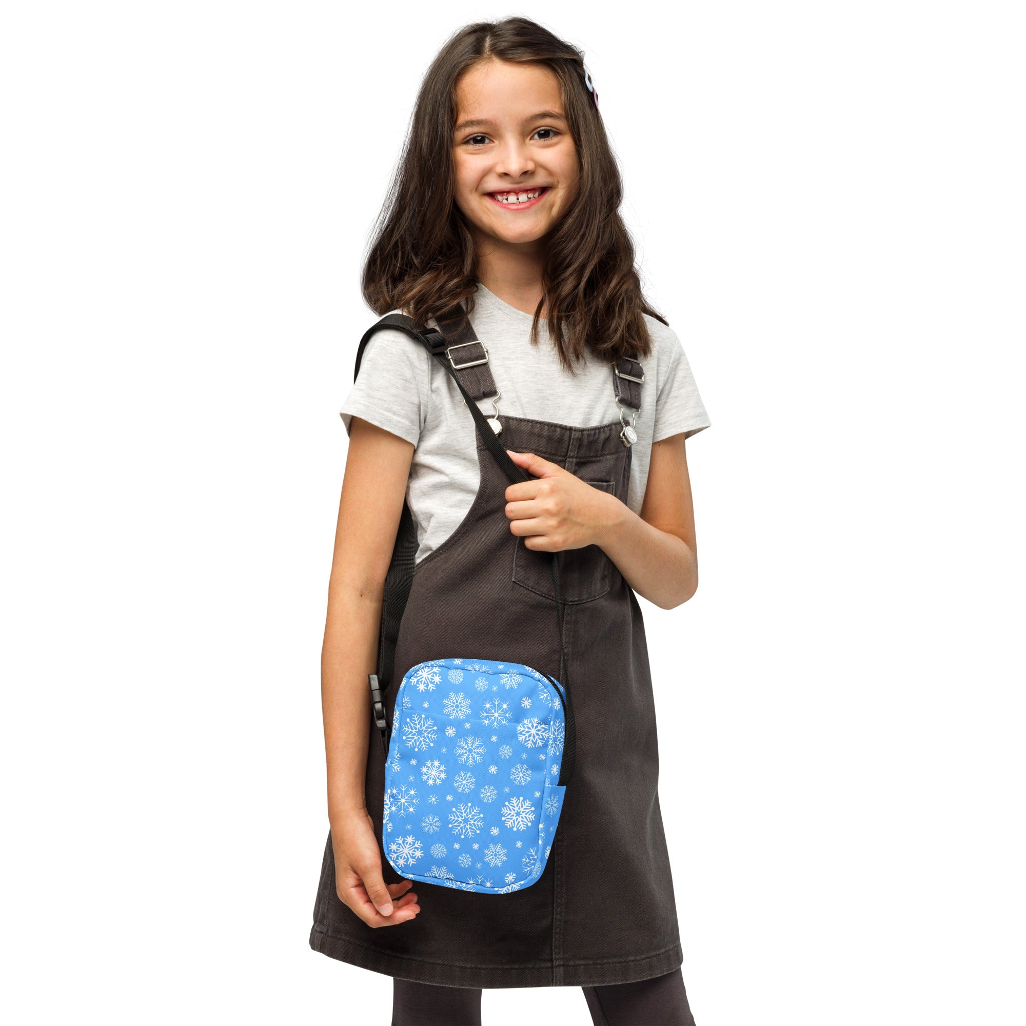Girls blue snowflake crossbody purse rectangular pouch with black straps and winter pattern perfect for casual use