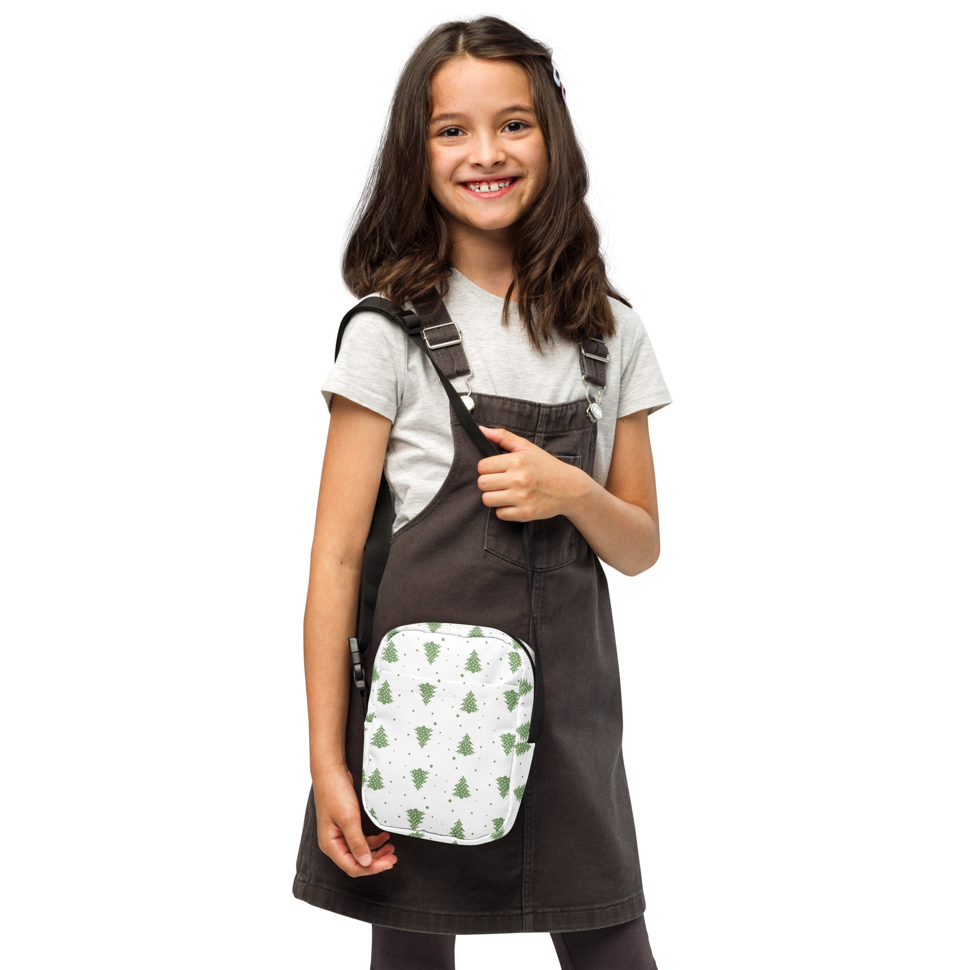 White crossbody bag with green pine tree pattern and black adjustable strap girls christmas trees purse
