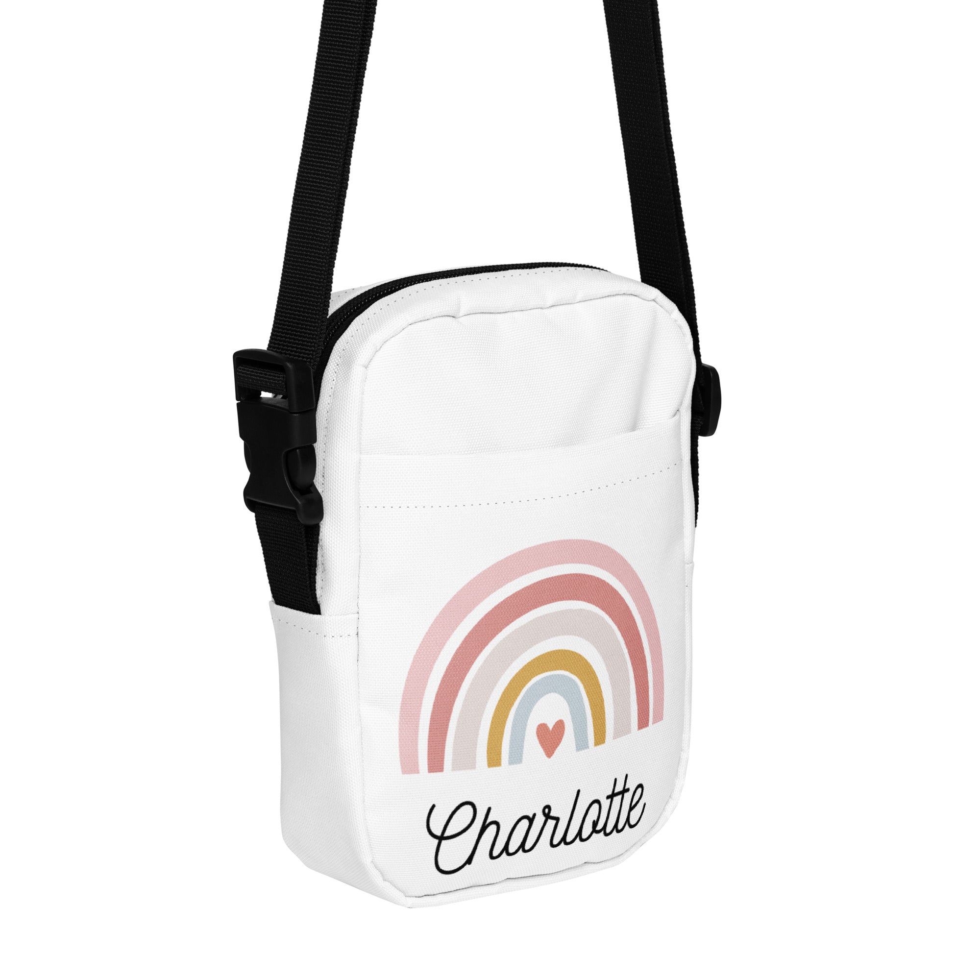 White crossbody bag with pastel rainbow design and the name charlotte in black cursive for girls custom purse