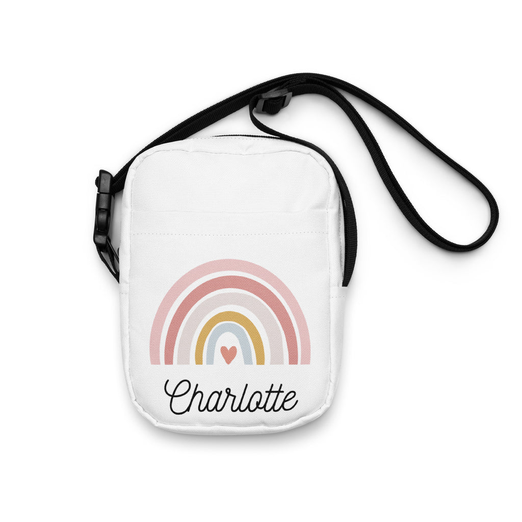 White canvas girls custom name rainbow crossbody purse with pastel rainbow, small heart, and charlotte in black cursive