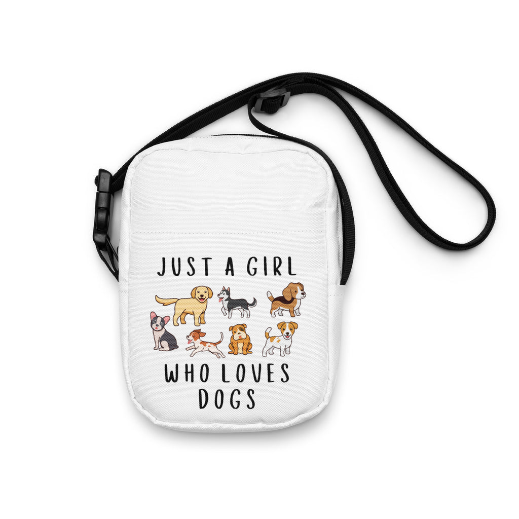 White crossbody purse featuring playful cartoon dogs and the text just a girl who loves dogs for girls